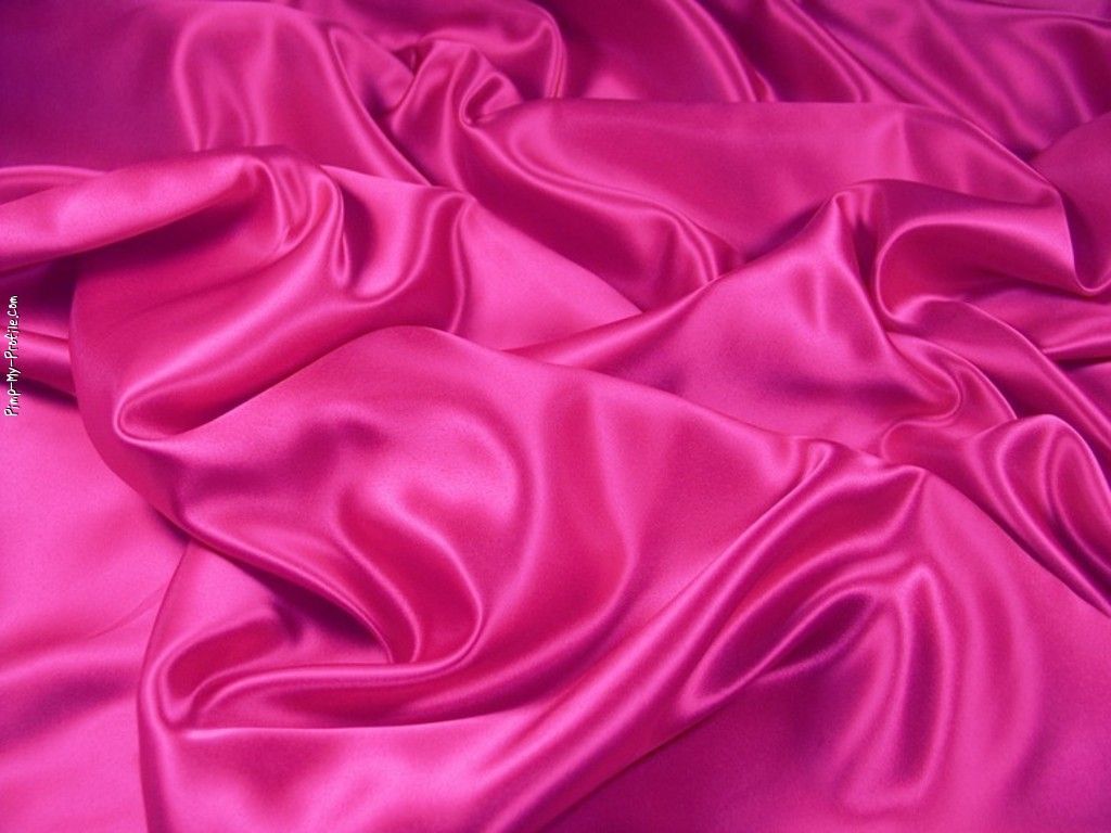 Pink satin fabric that is wrinkled and crumpled - Silk