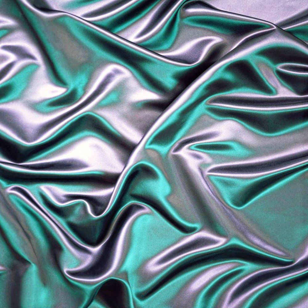 Metallic teal and silver wave of fabric - Silk