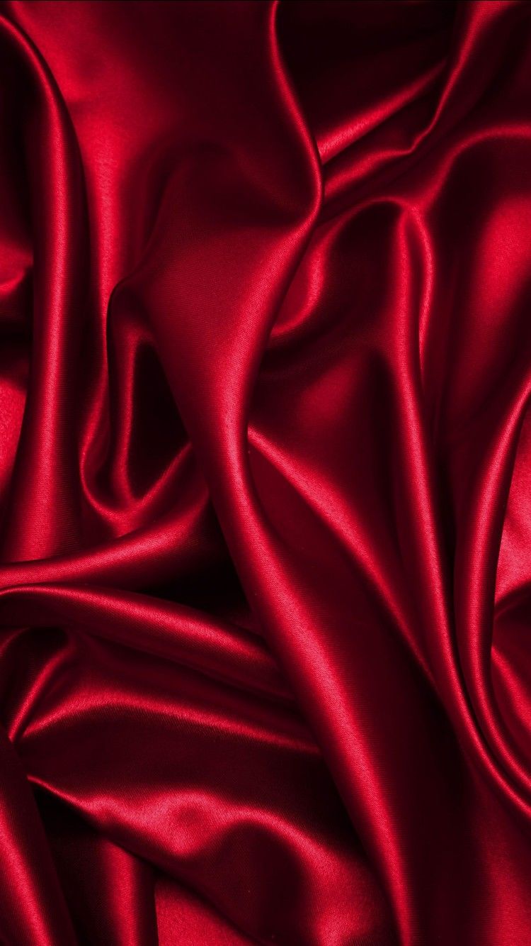 A beautiful red silk fabric with a wavy texture, folded and displayed in a 4K HD wallpaper. - Silk