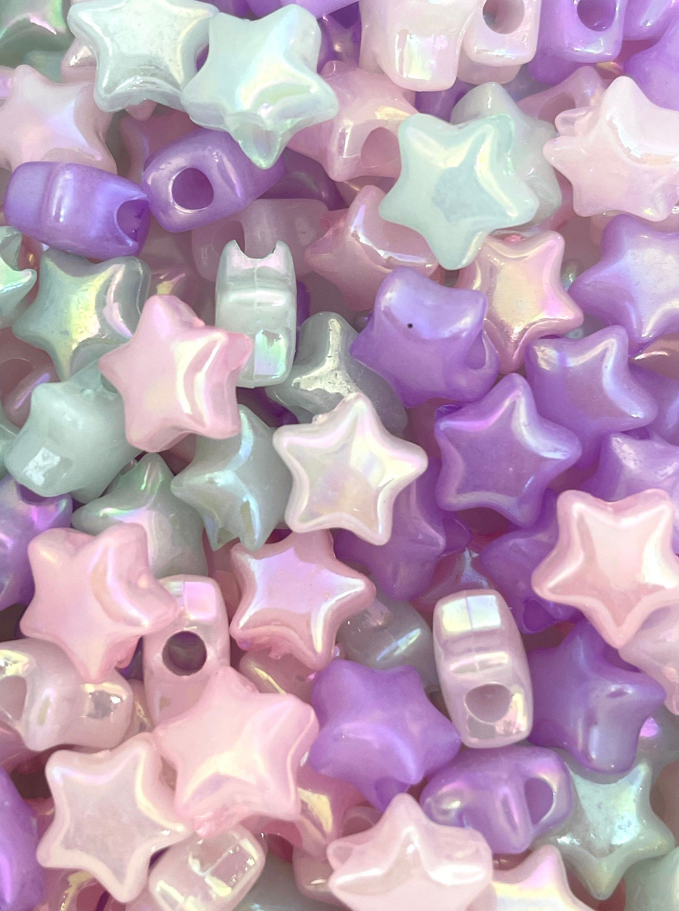 A mix of purple, pink and green star beads - Iridescent