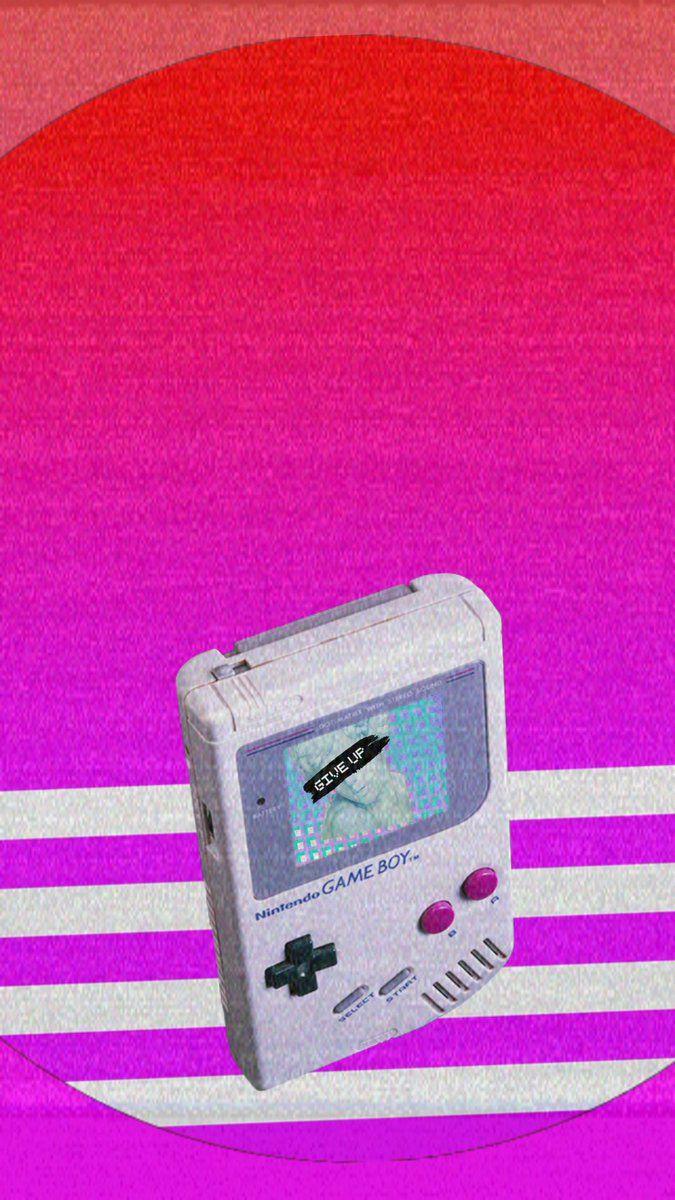 A Nintendo Gameboy on a pink and purple striped background - Game Boy