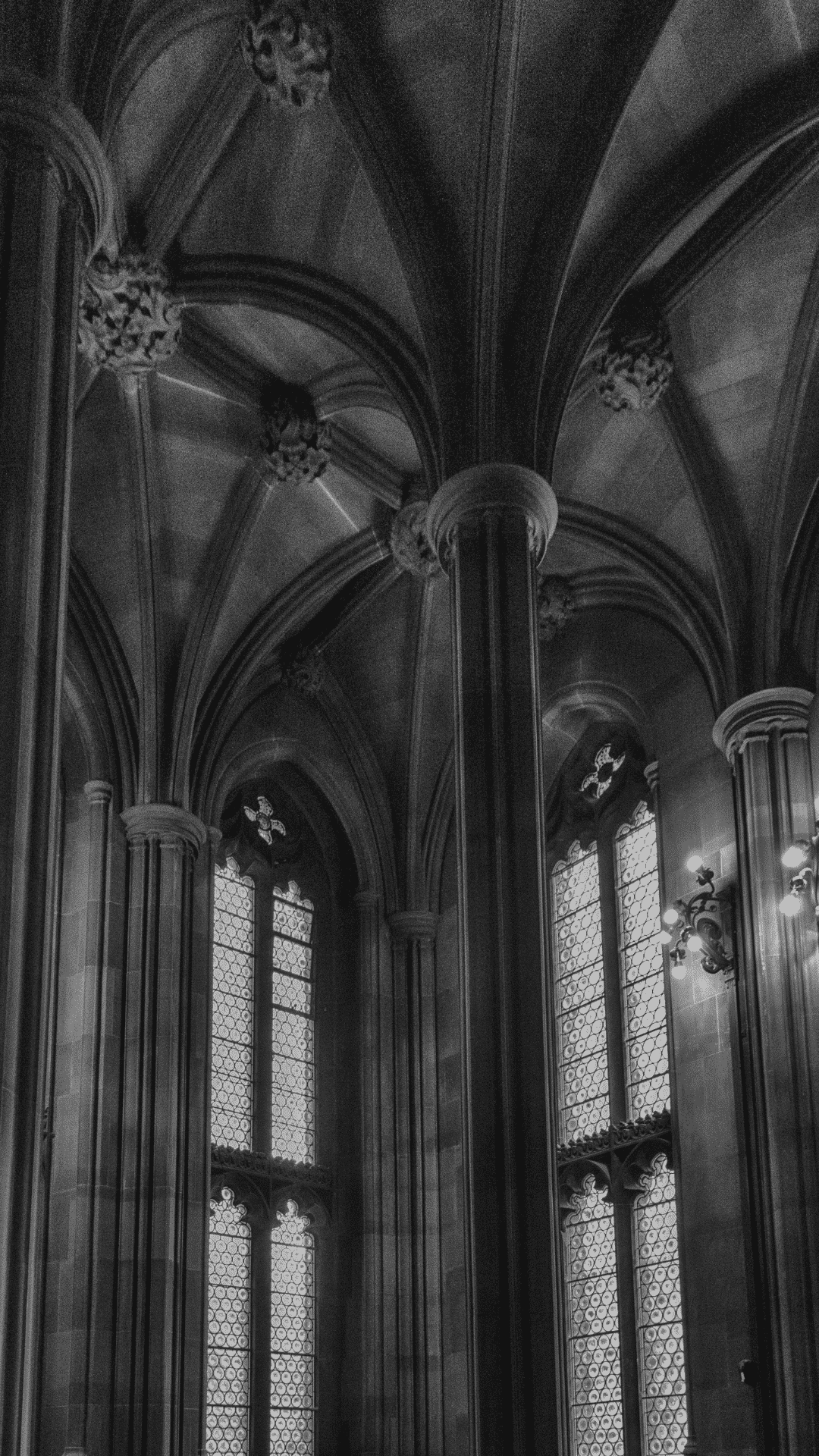A black and white photo of a cathedral with high arched windows - Slytherin, Hogwarts