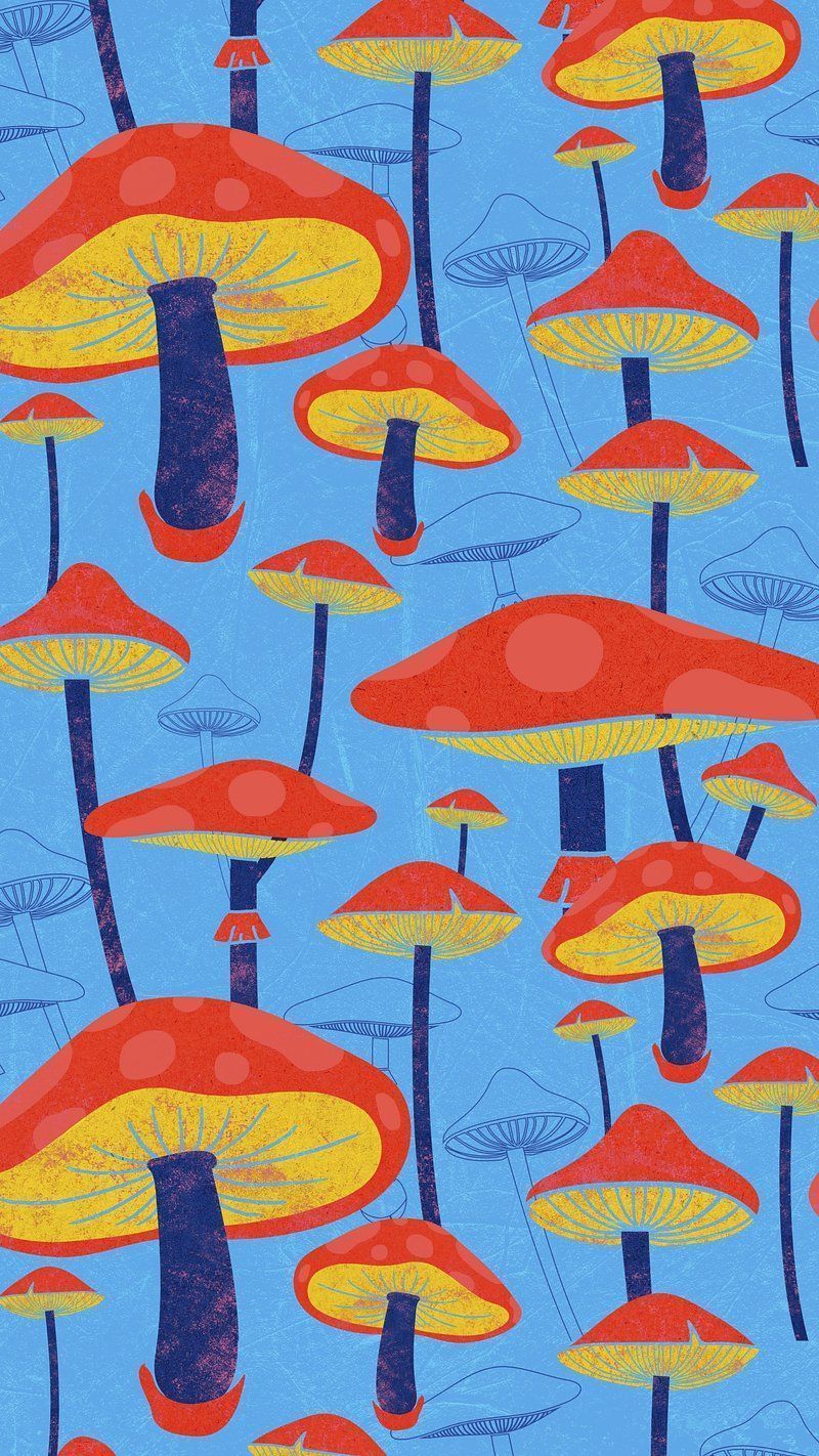 A phone wallpaper with a pattern of red mushrooms on a blue background - Psychedelic