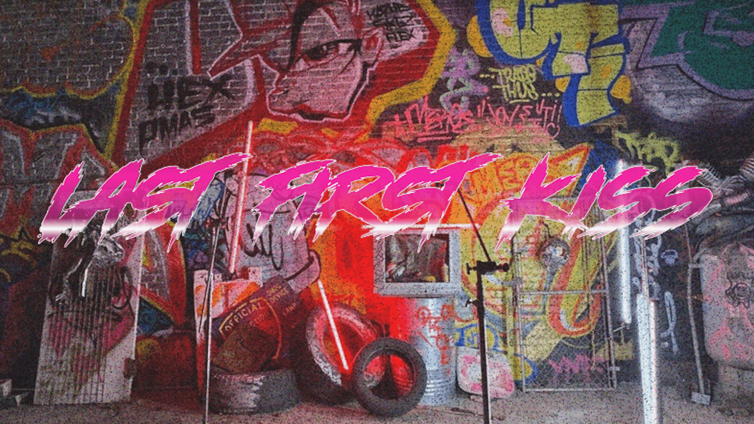 A wall covered in graffiti with the words 