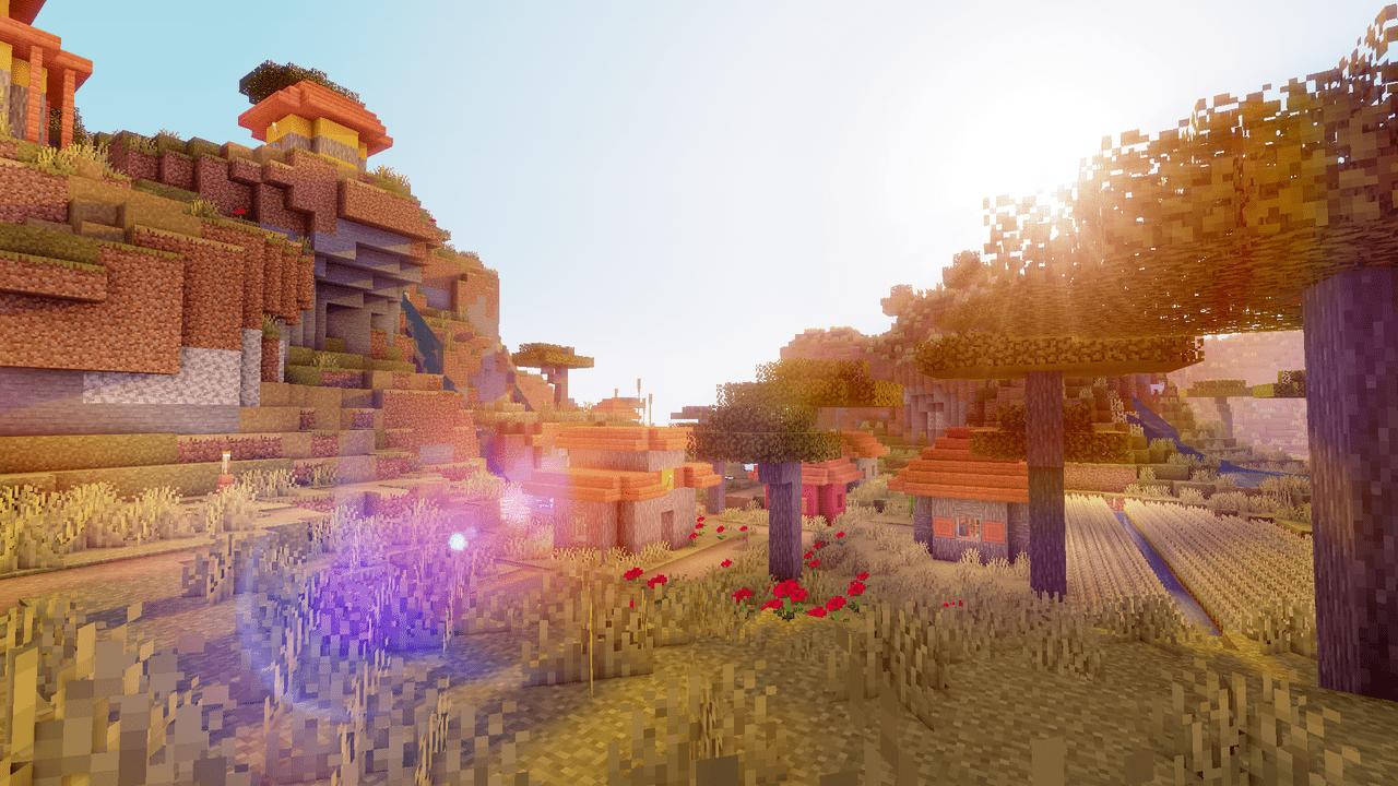 Minecraft screenshot of a beautiful sunset over a village - Minecraft
