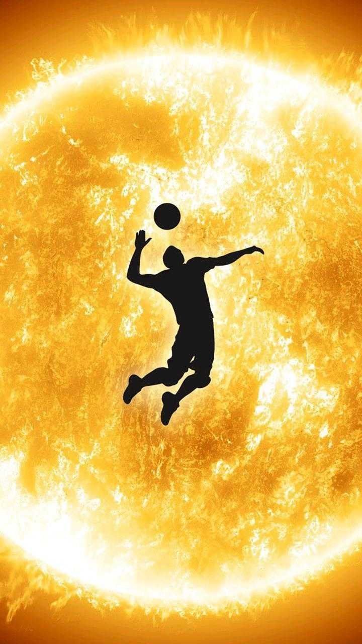 Volleyball player jumping in front of the sun - Volleyball