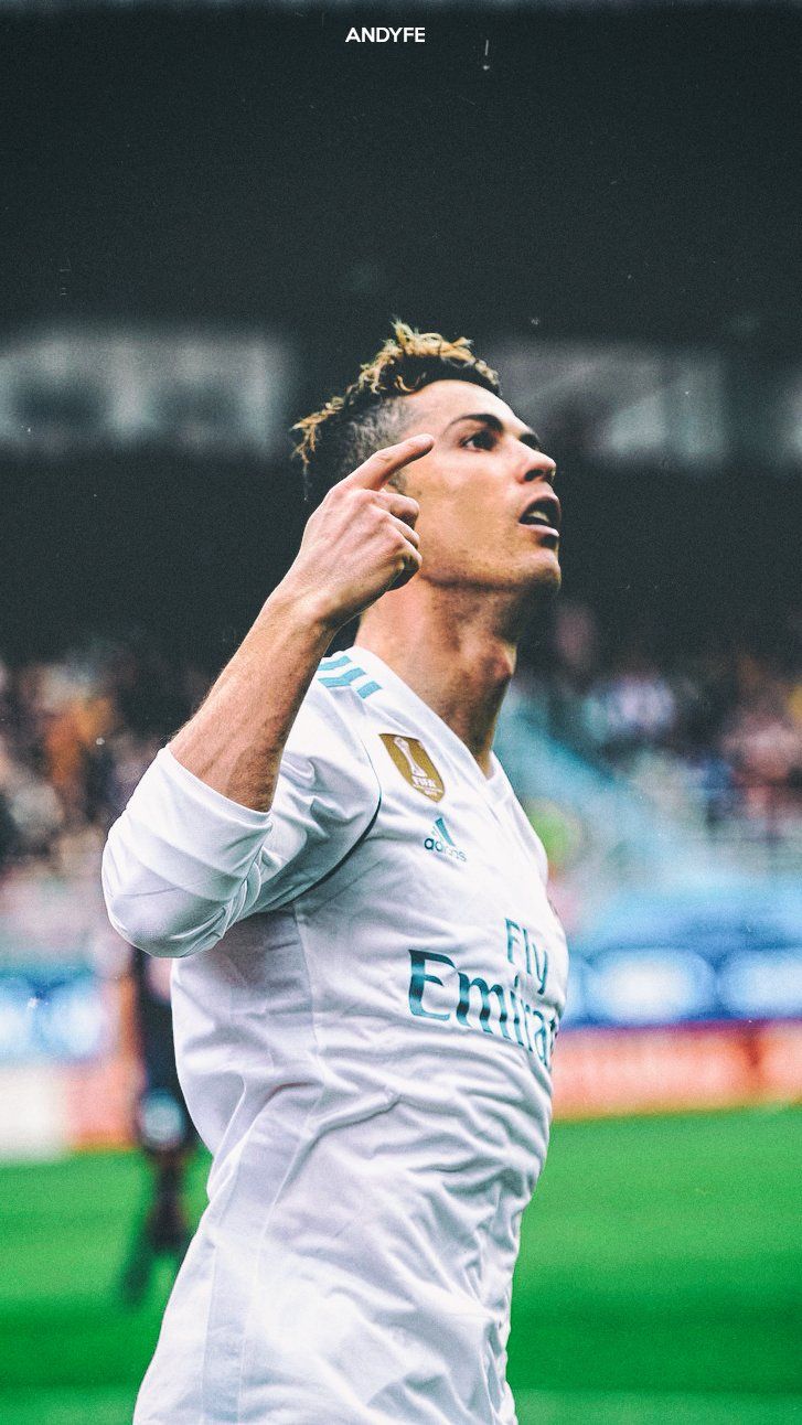 Cristiano Ronaldo celebrates after scoring a goal for Real Madrid. - Cristiano Ronaldo