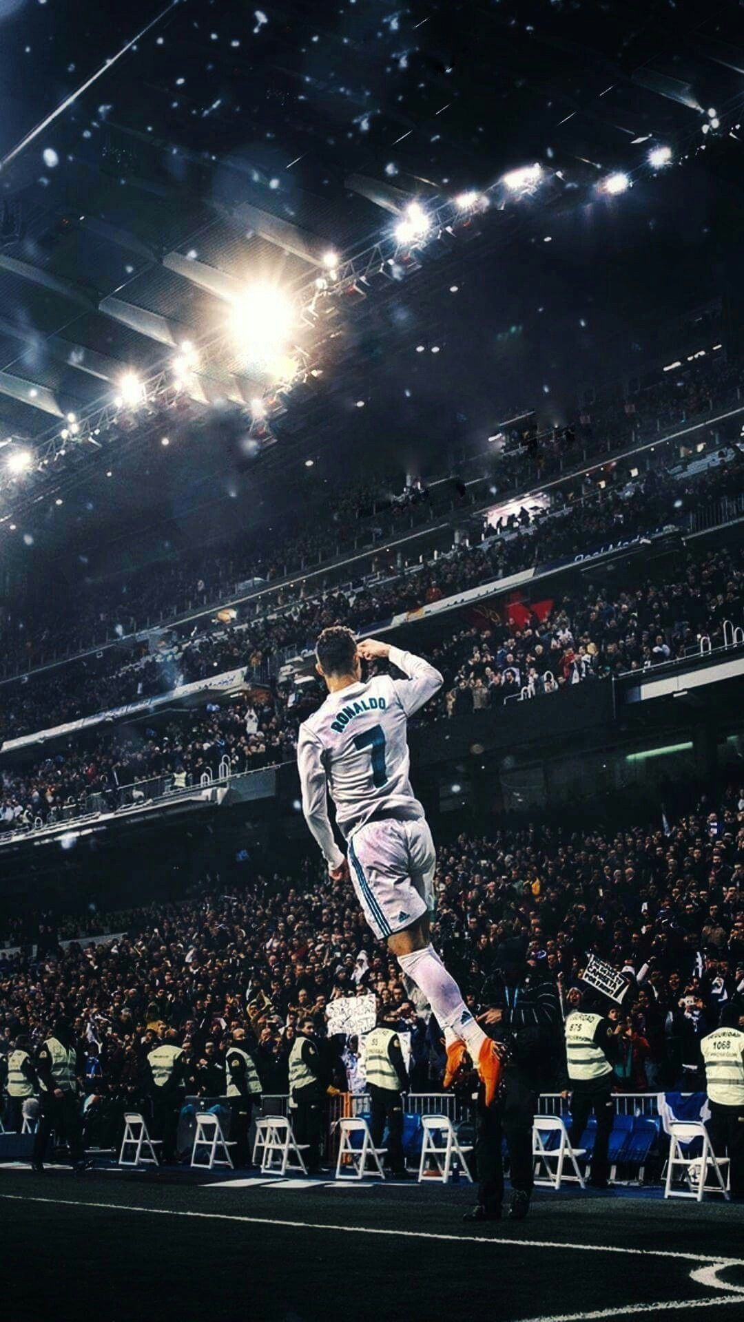 Cristiano Ronaldo jumping in the air in front of a packed stadium - Cristiano Ronaldo