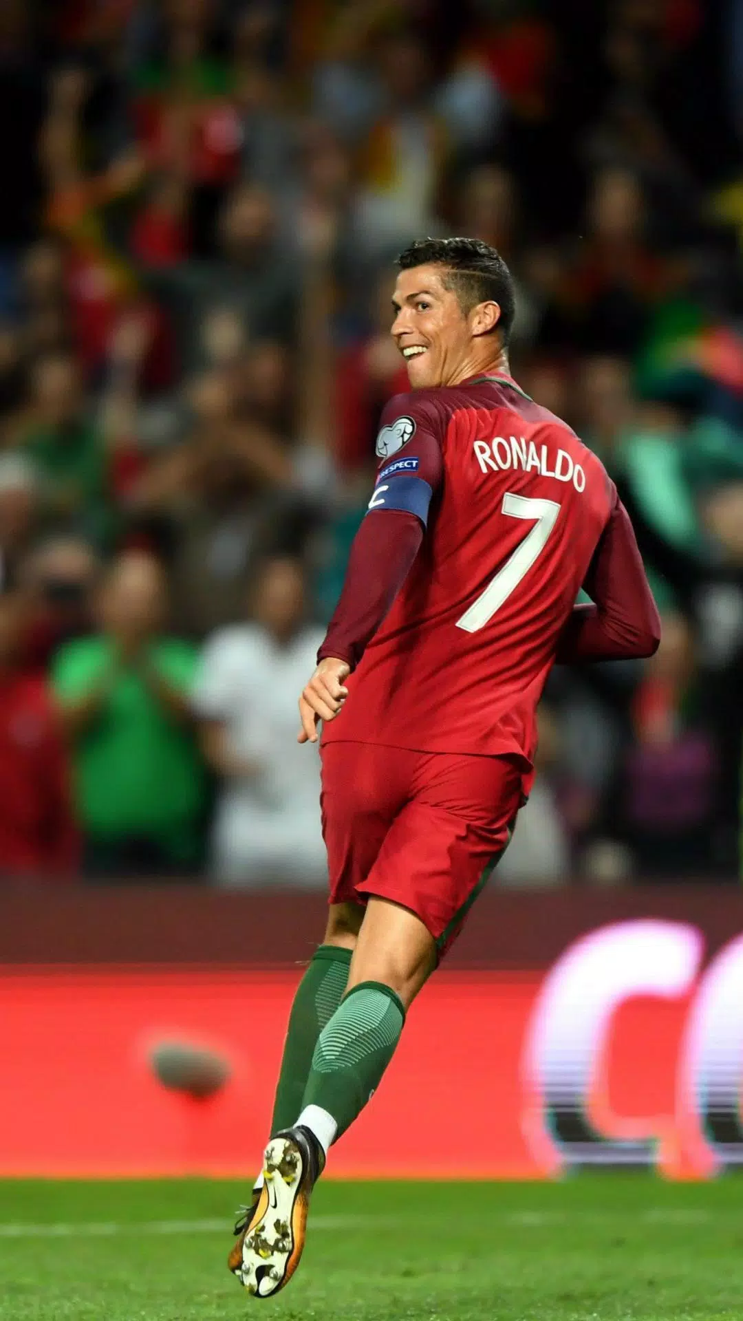 Cristiano Ronaldo celebrating after scoring a goal during a soccer match - Cristiano Ronaldo