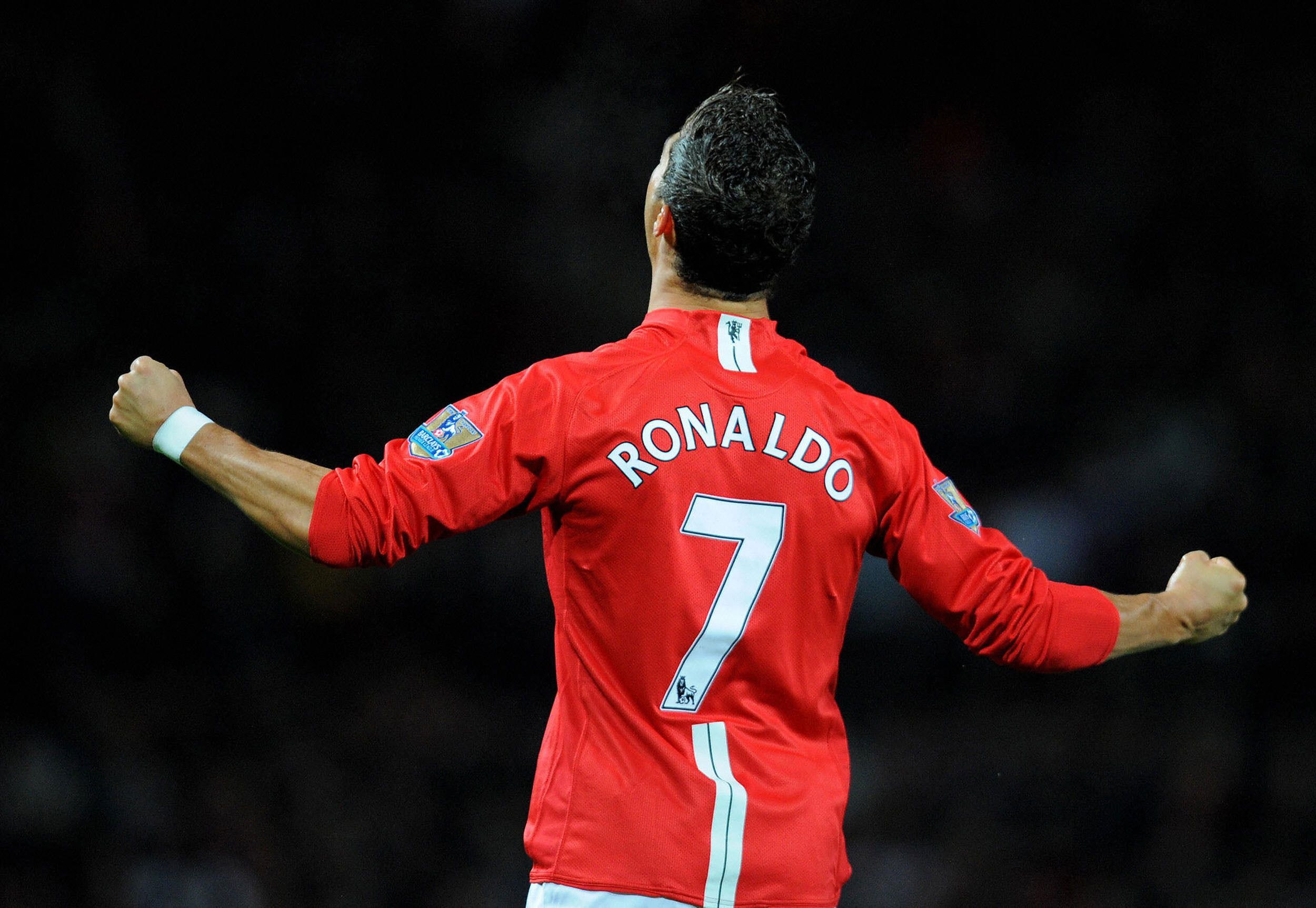 Cristiano Ronaldo celebrates after scoring a goal for Manchester United in 2012. - Cristiano Ronaldo