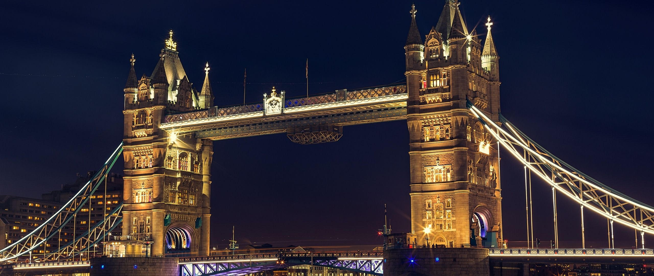 The Tower Bridge in London, England at night. - London