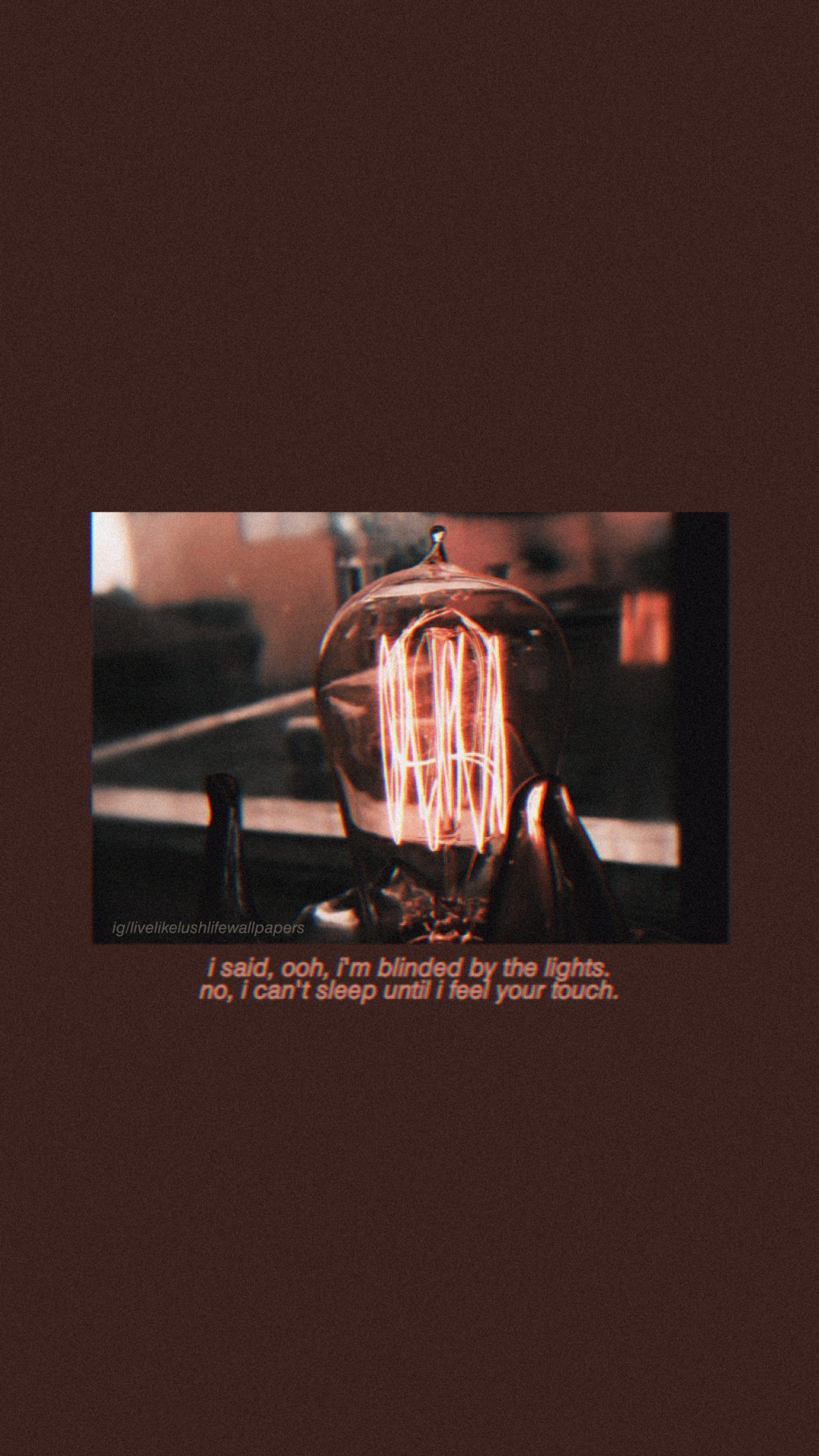 Aesthetic background of a lit light bulb with a quote. - The Weeknd
