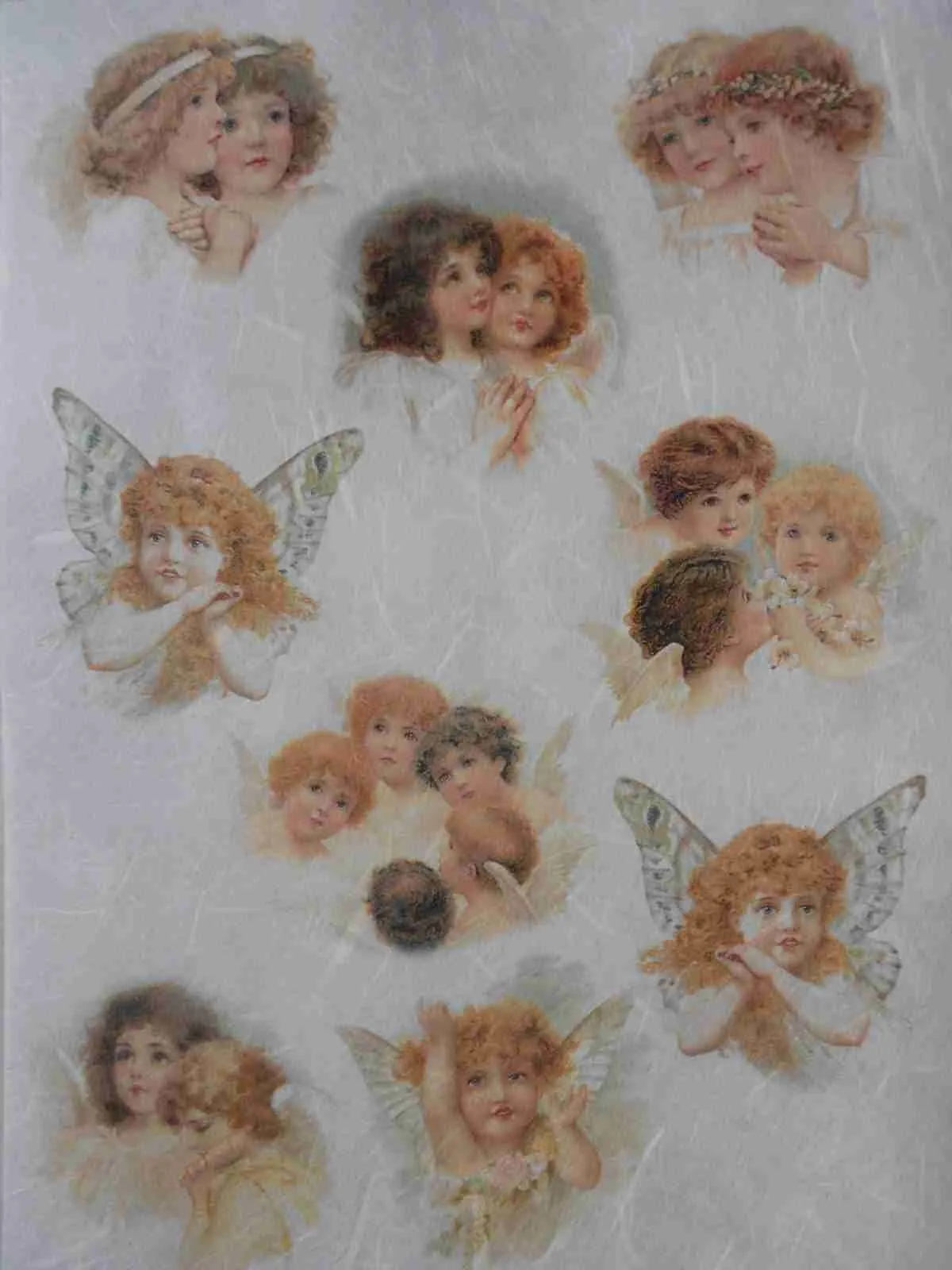 A sheet of rice paper with images of angels on it - Angels