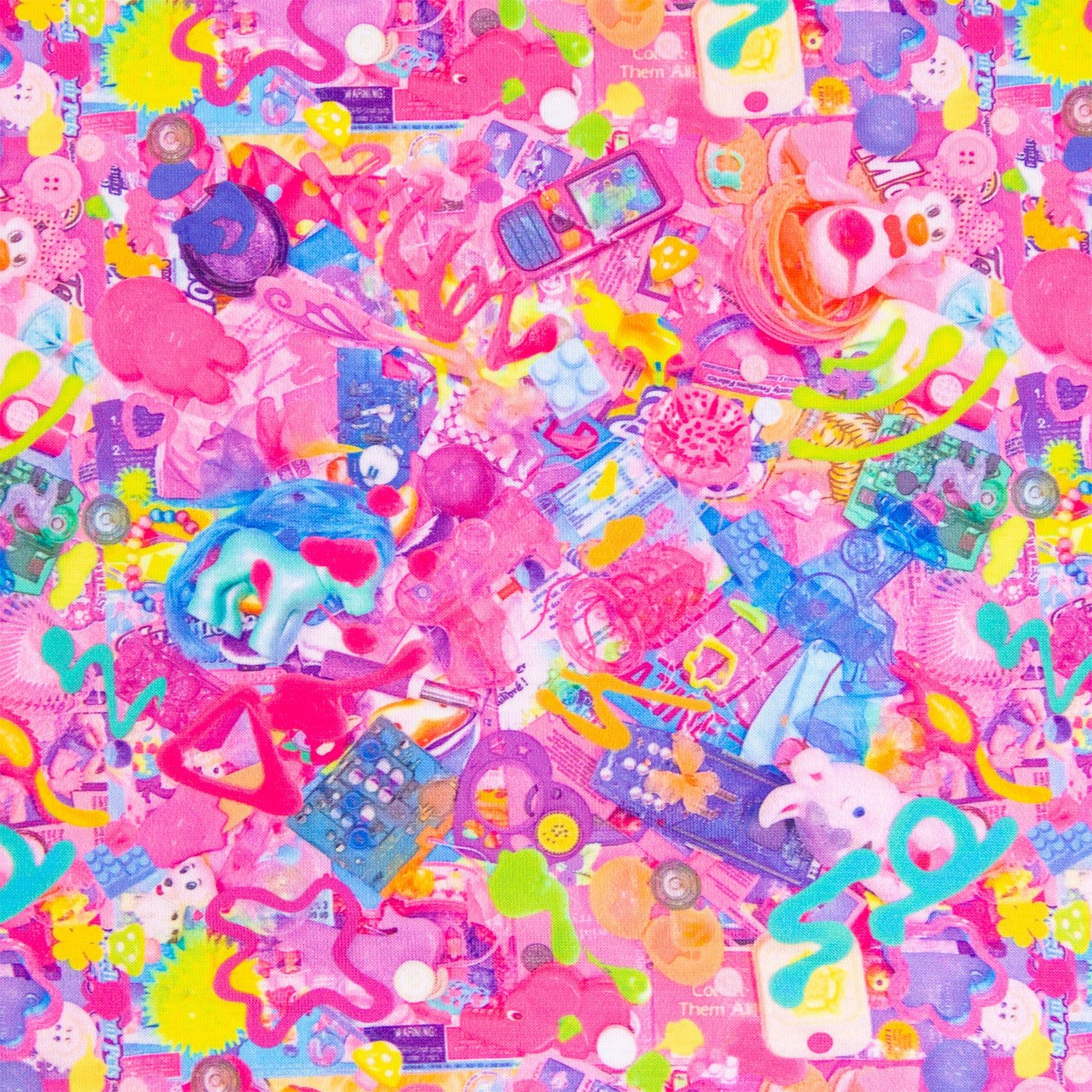 A close up of a pink patterned fabric with various toys and objects on it. - Kidcore