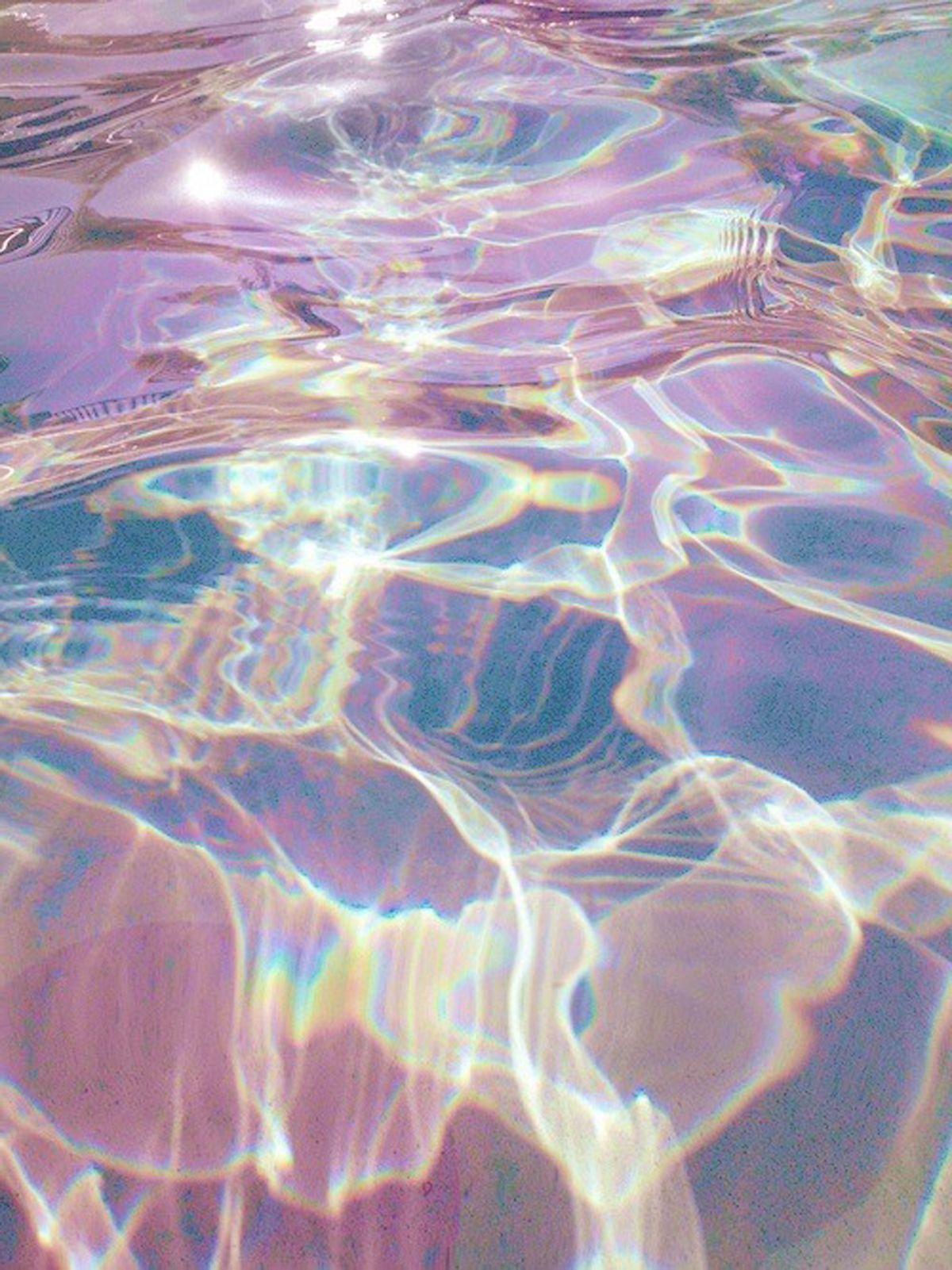The water is reflecting the sunlight in the pool - Iridescent