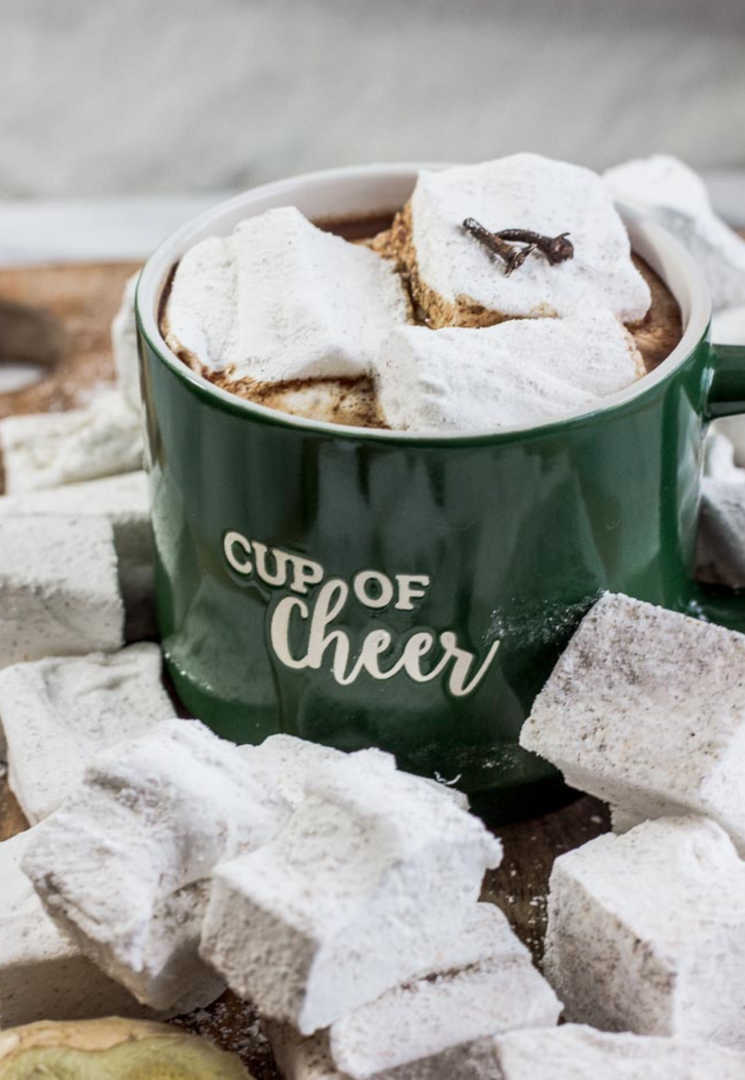 A mug of hot chocolate topped with homemade vanilla and almond marshmallows. - Marshmallows