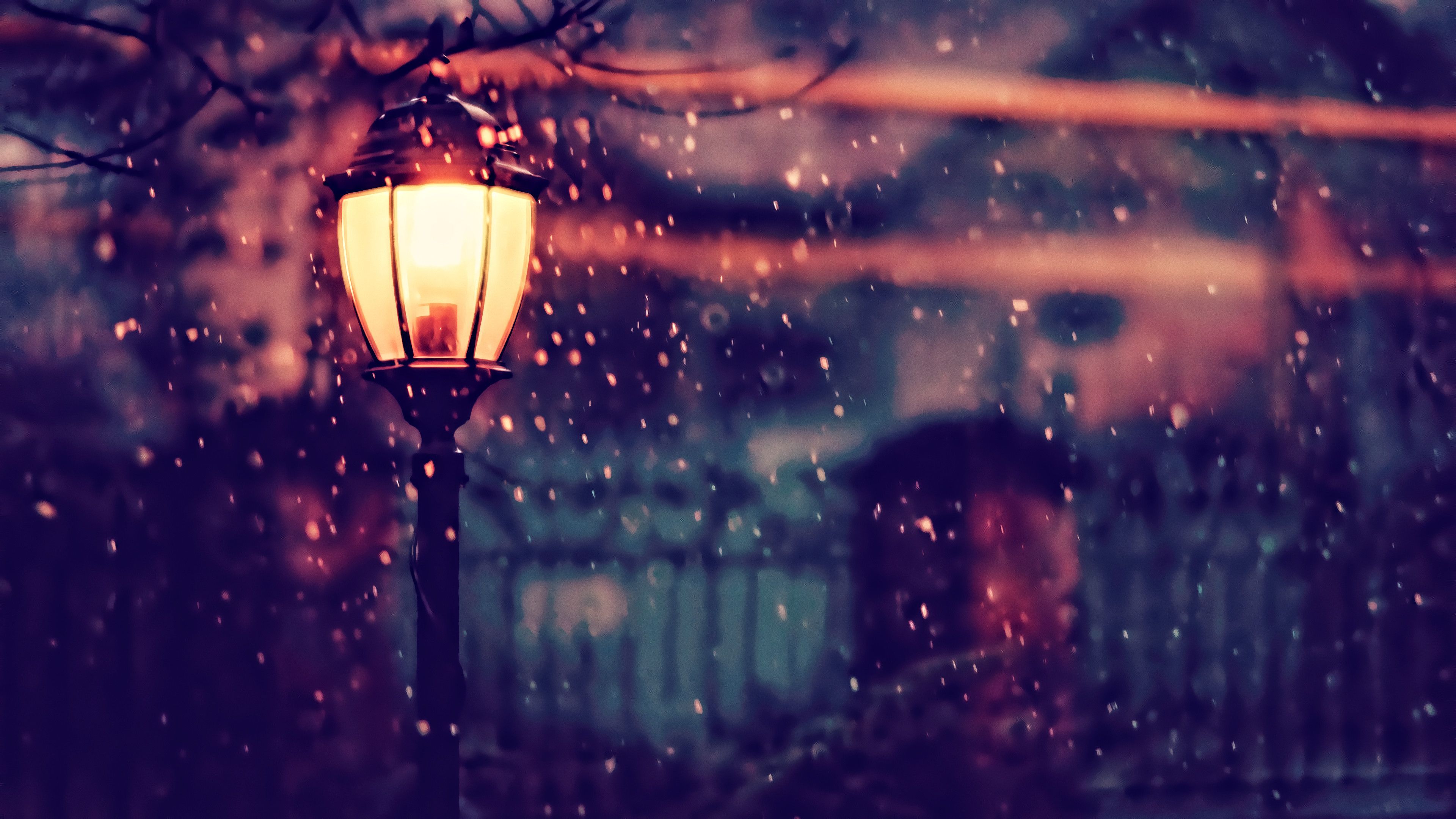 A snowy night with a lit street lamp. - Warm