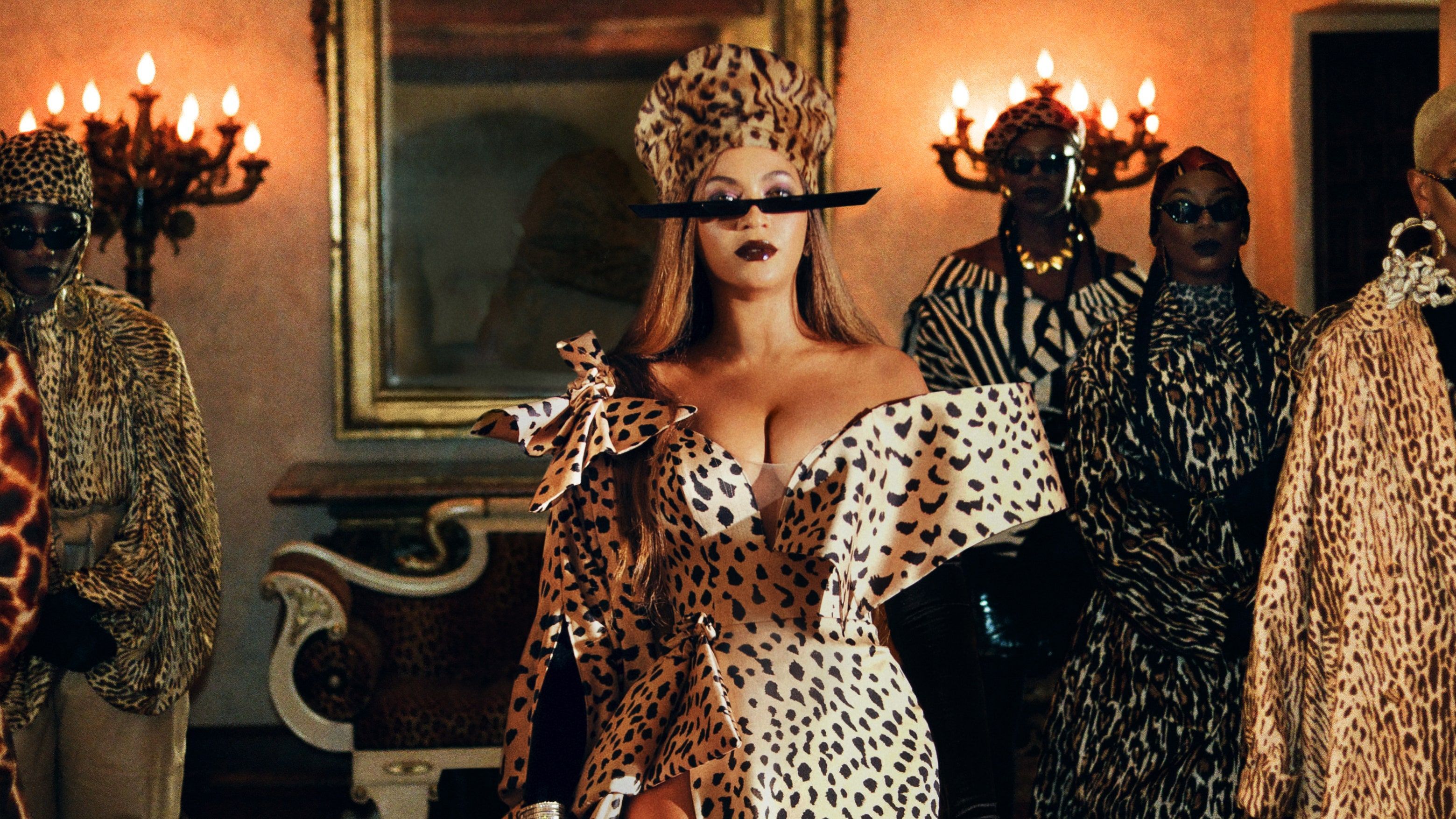 Beyoncé wears a leopardprint dress and holds a knife to her eye in the music video for 