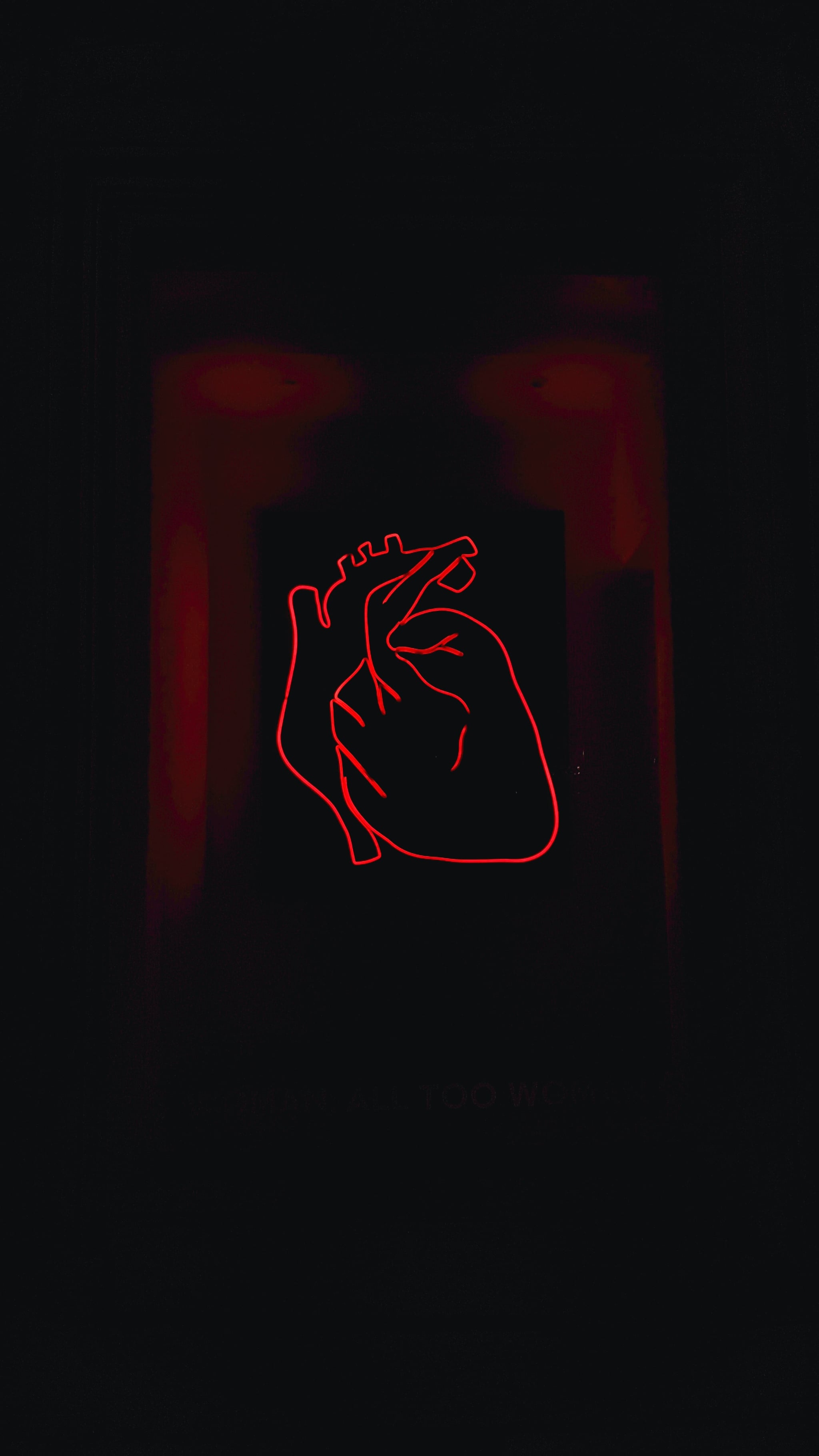 A red heart shaped light in the dark - Black, heart, dark phone, black phone, black heart