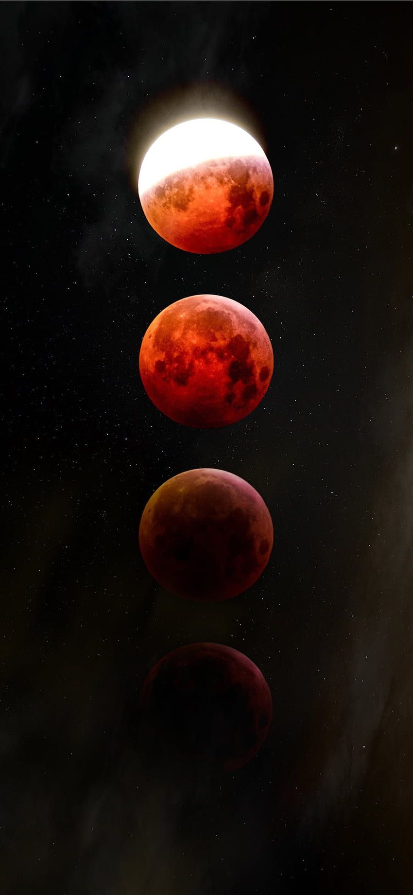 A total lunar eclipse is visible in the night sky. - Eclipse