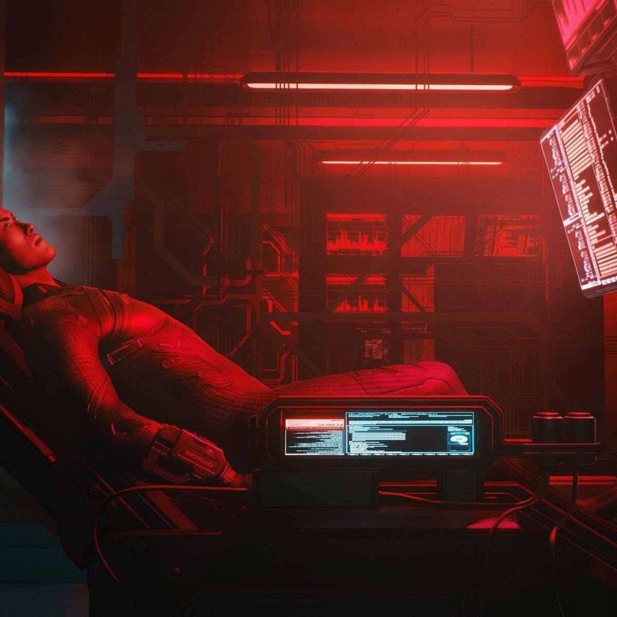 A woman lying in a bed with a laptop and a TV screen in a red-lit room. - Cyberpunk 2077