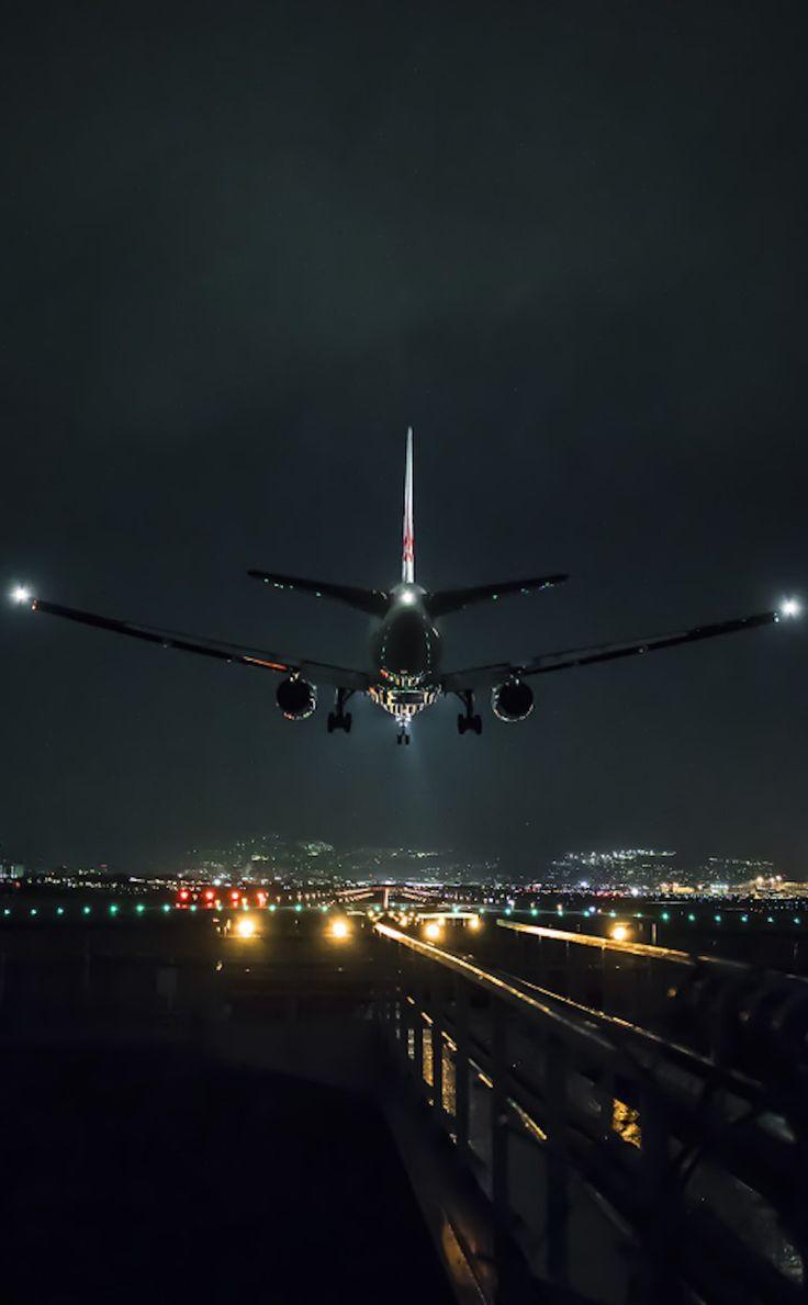 An airplane taking off at night - Airplane