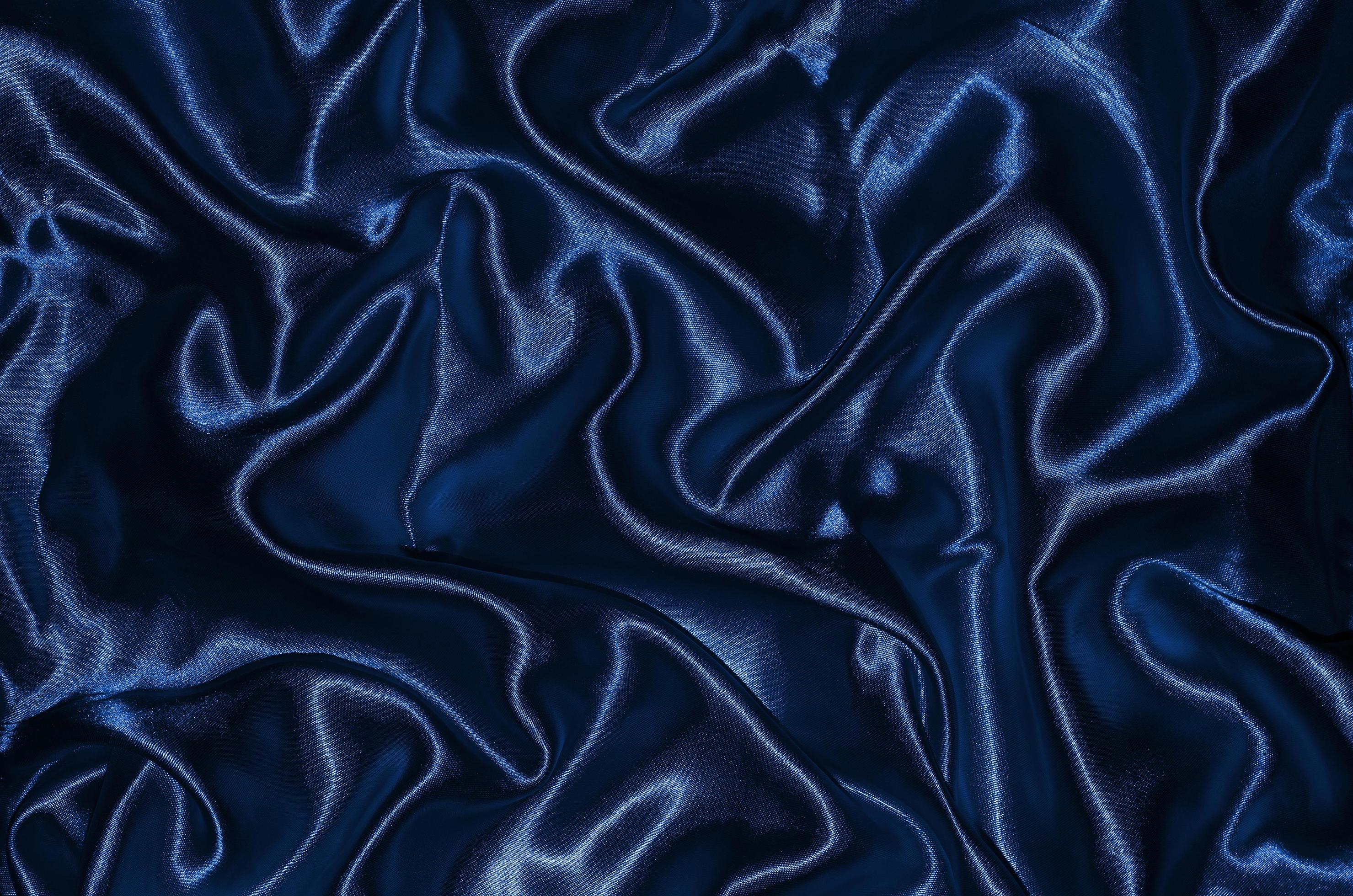 A close up of dark blue silk fabric - Dark blue