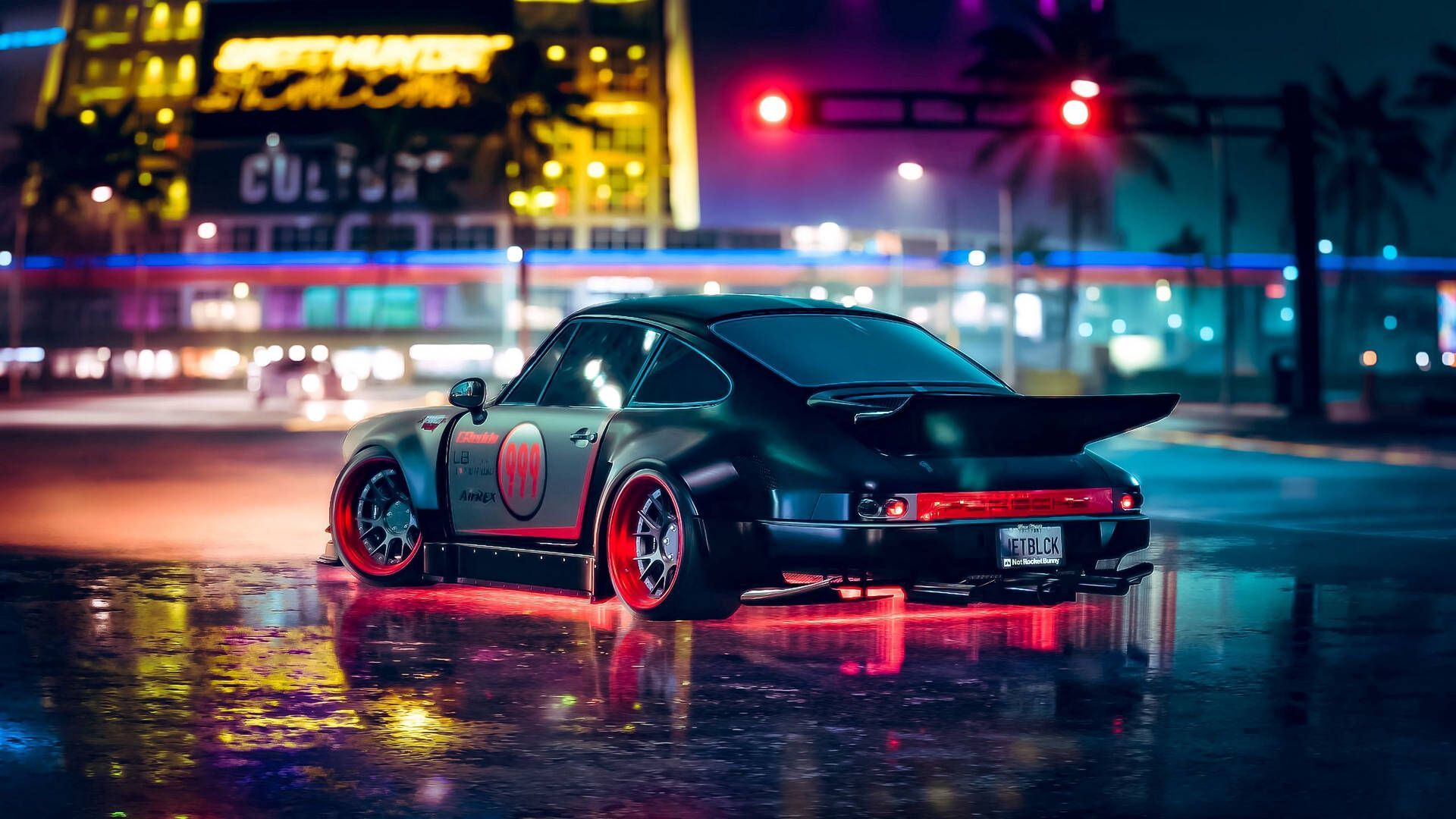 A black car with neon lights on the street - Cars