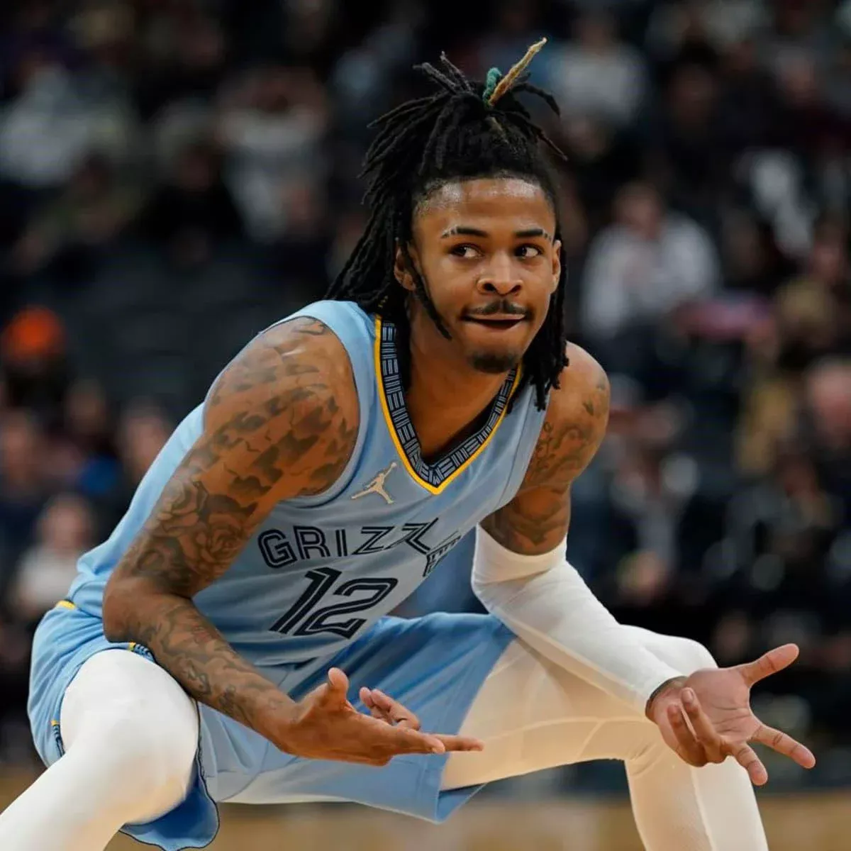 Ja Morant of the Memphis Grizzlies looks on during a game against the Denver Nuggets - Ja Morant