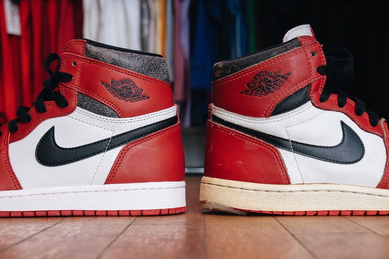 A pair of red and white air jordan shoes - Air Jordan 1