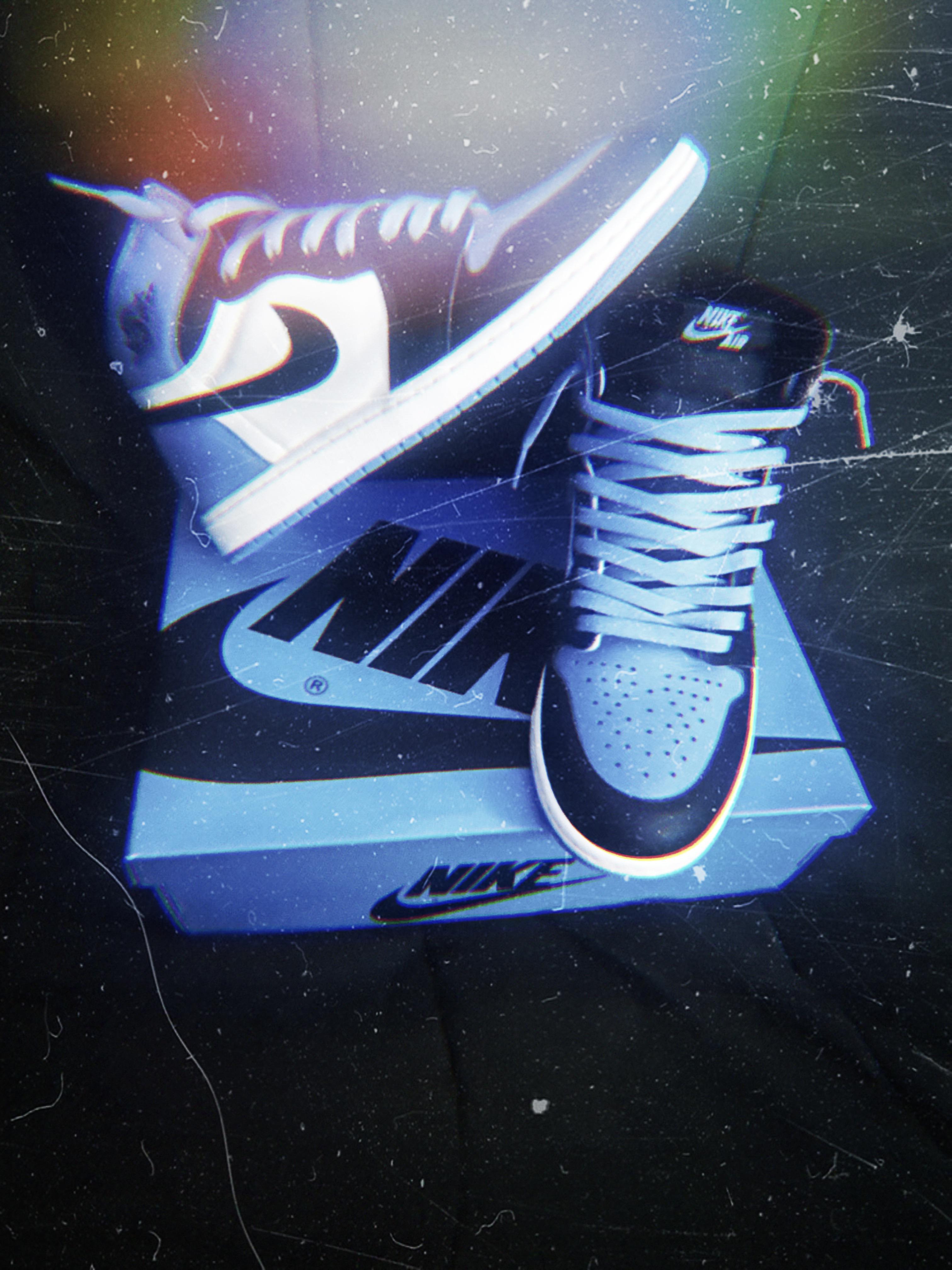 A pair of sneakers on top blue box - Air Jordan 1