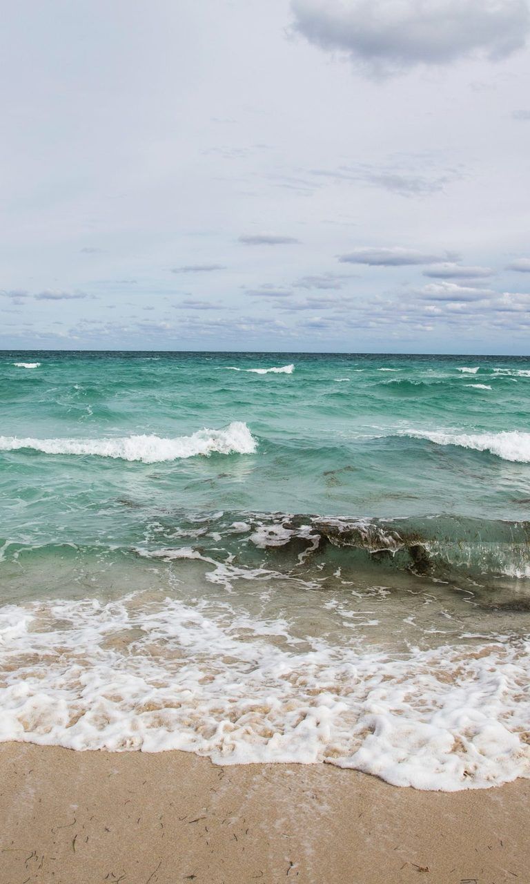 Beautiful waves of a sandy beach in Miami Beach, Florida
