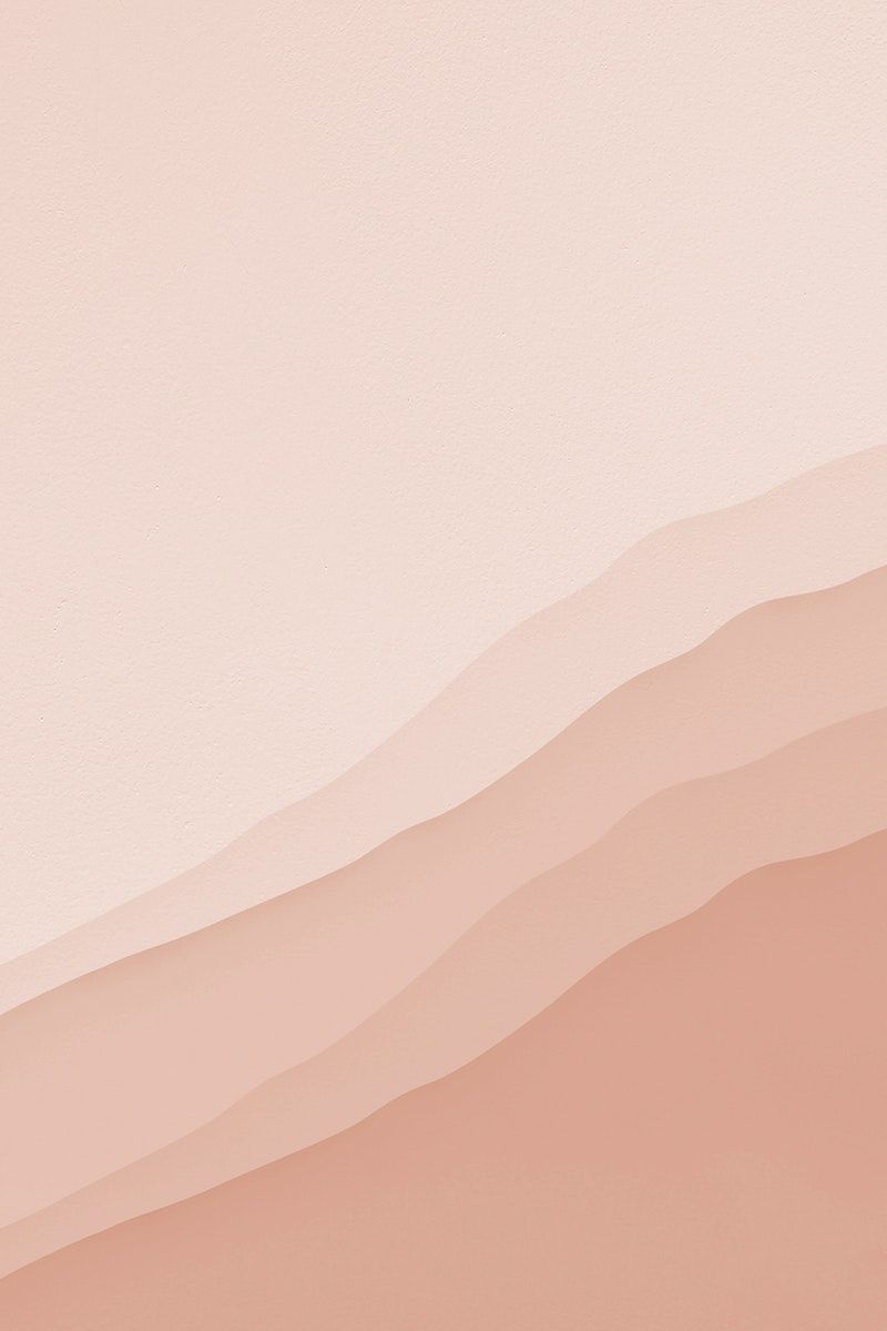 A pink and white background with mountains - Salmon