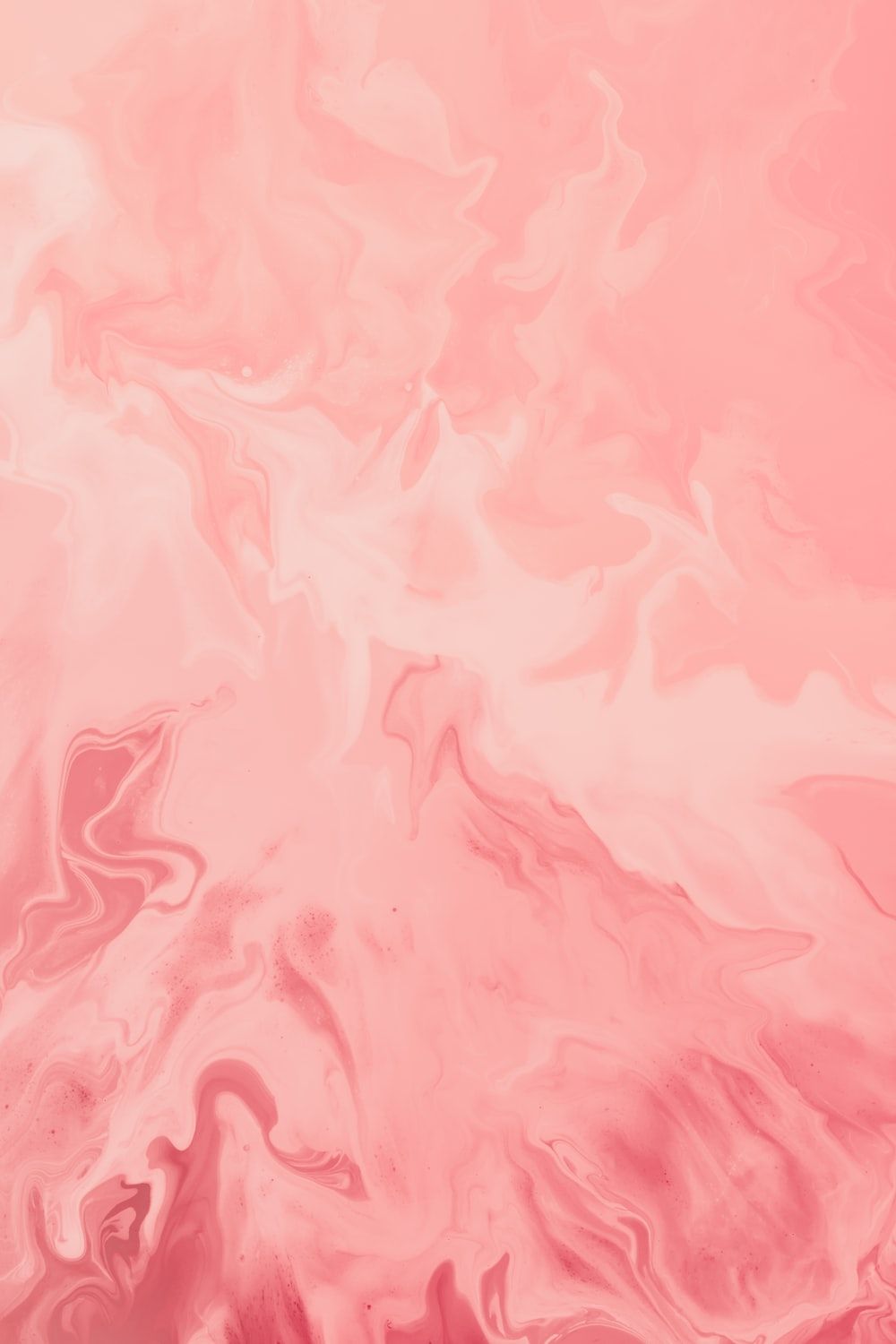 A close up of a pink and white marbled surface - Salmon