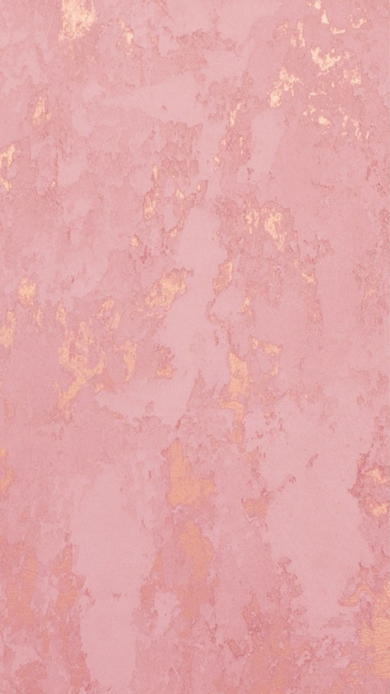 A pink and gold wallpaper with some texture - Salmon