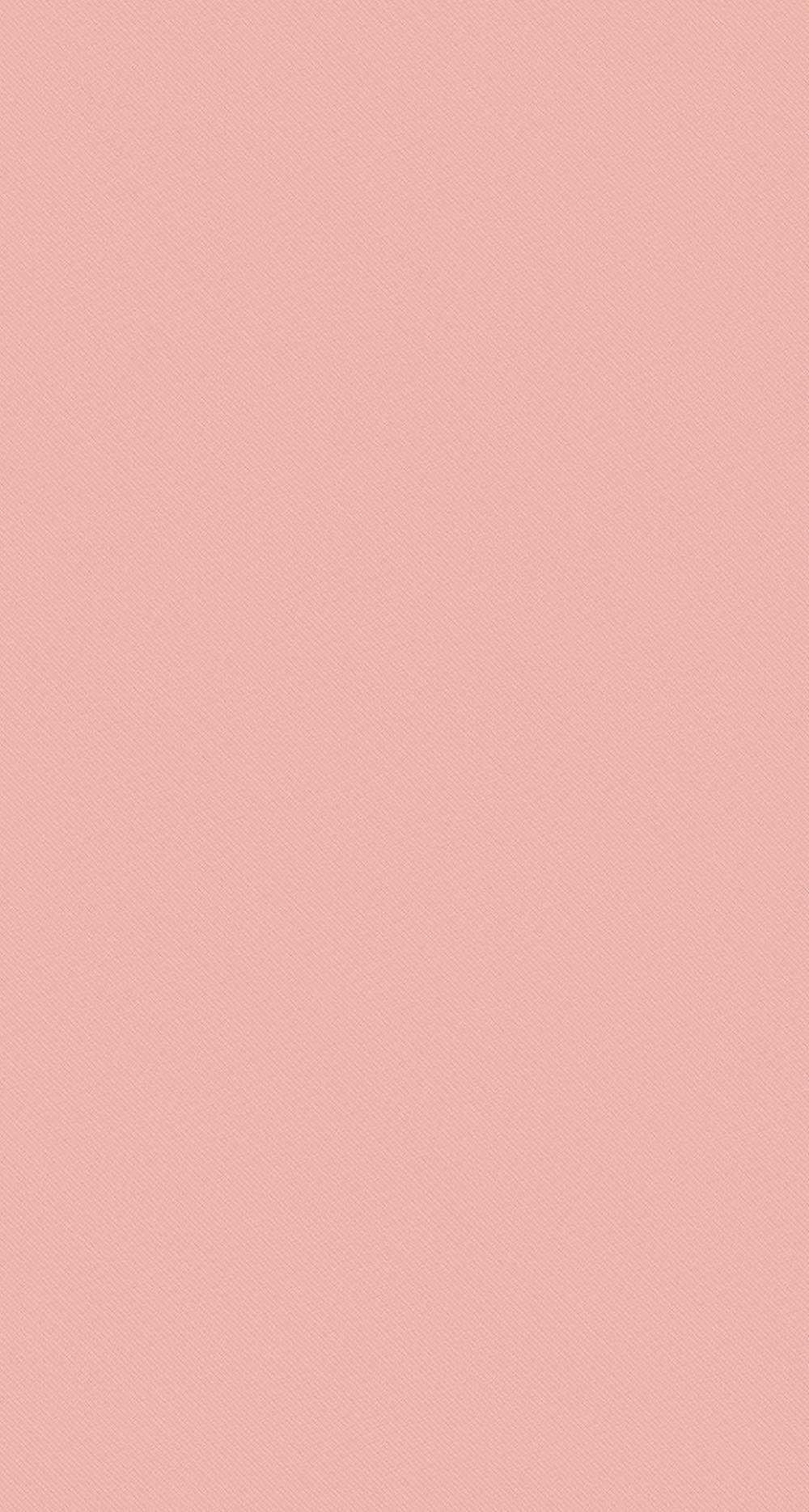 A light pink background with a slight texture - Salmon