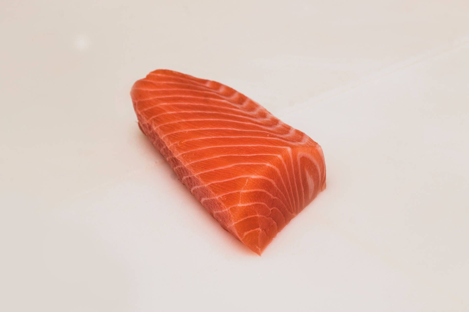 Download Salmon Raw Slice On Plain White Wallpaper