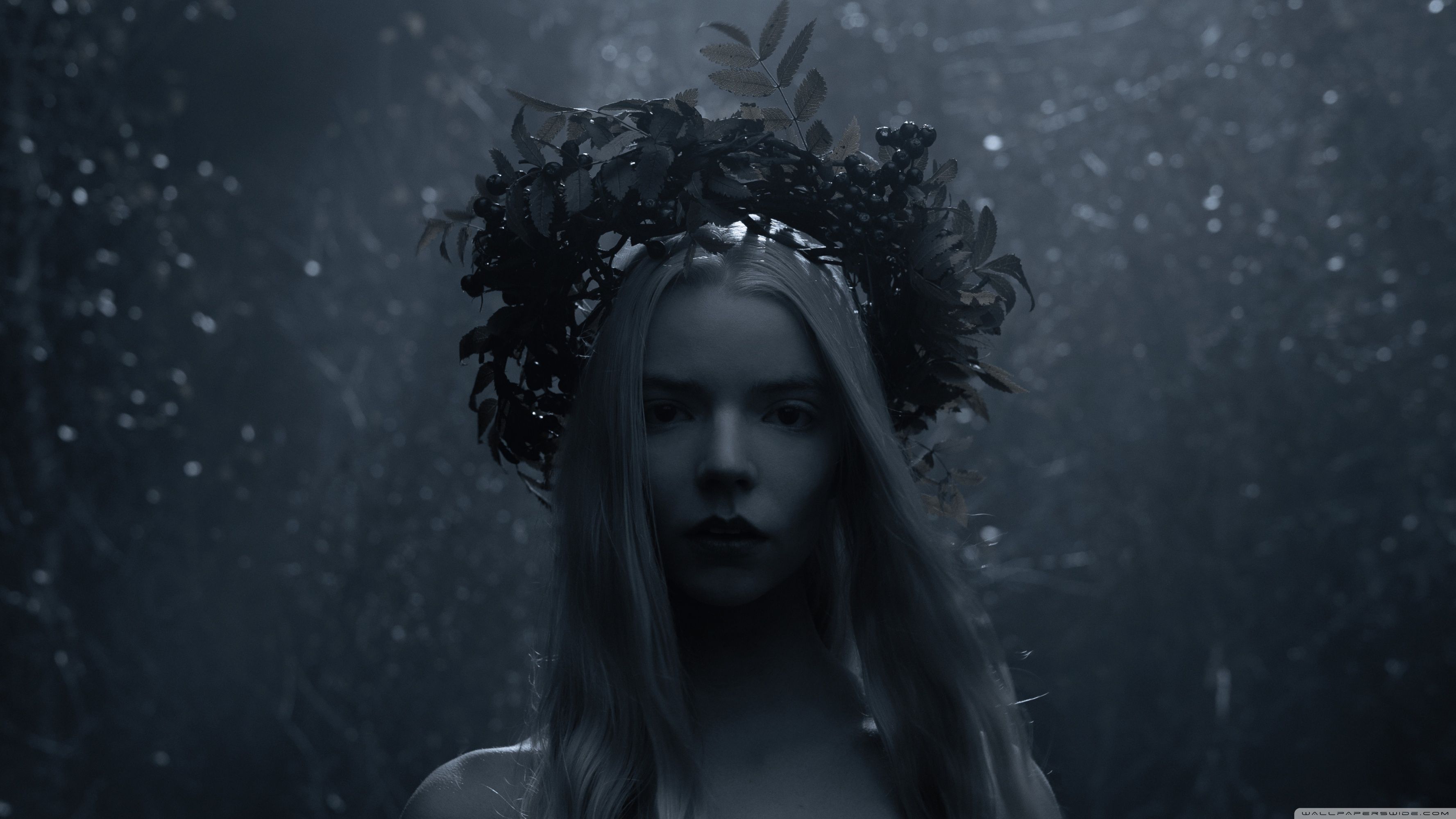 A woman with long hair wearing an elaborate headpiece - Anya Taylor-Joy