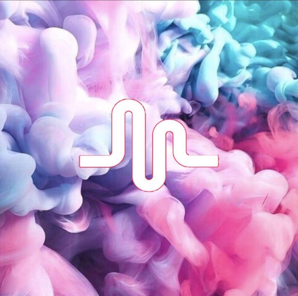 The logo of TikTok, a popular social media app, on a background of colorful smoke. - TikTok