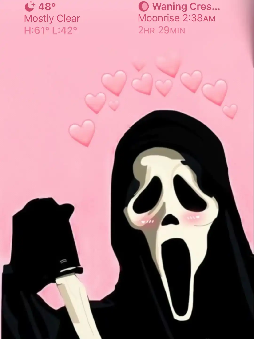 A scary face with hearts on it - Ghostface