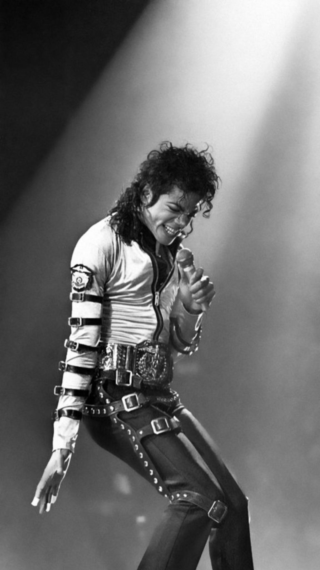 Michael Jackson performing on stage in a black and white photo - Michael Jackson