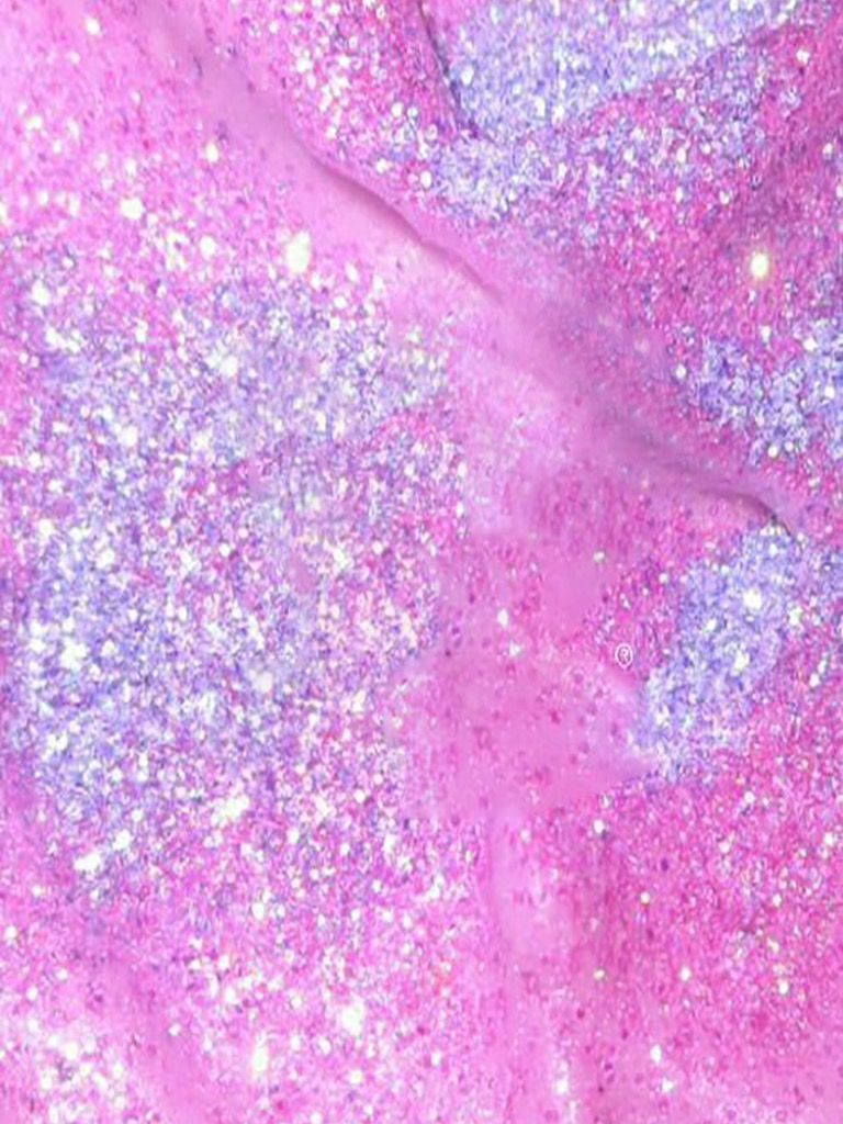 A close up of a pink and purple glittery background - Slime