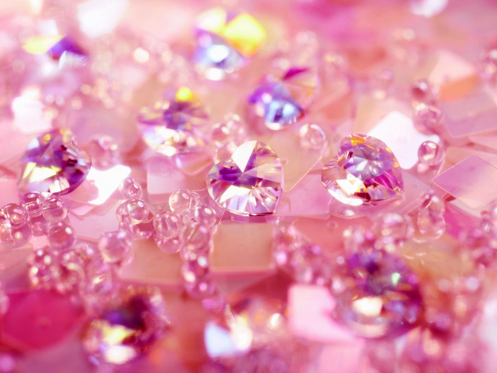 A close up of pink and purple crystals - Diamond, bling
