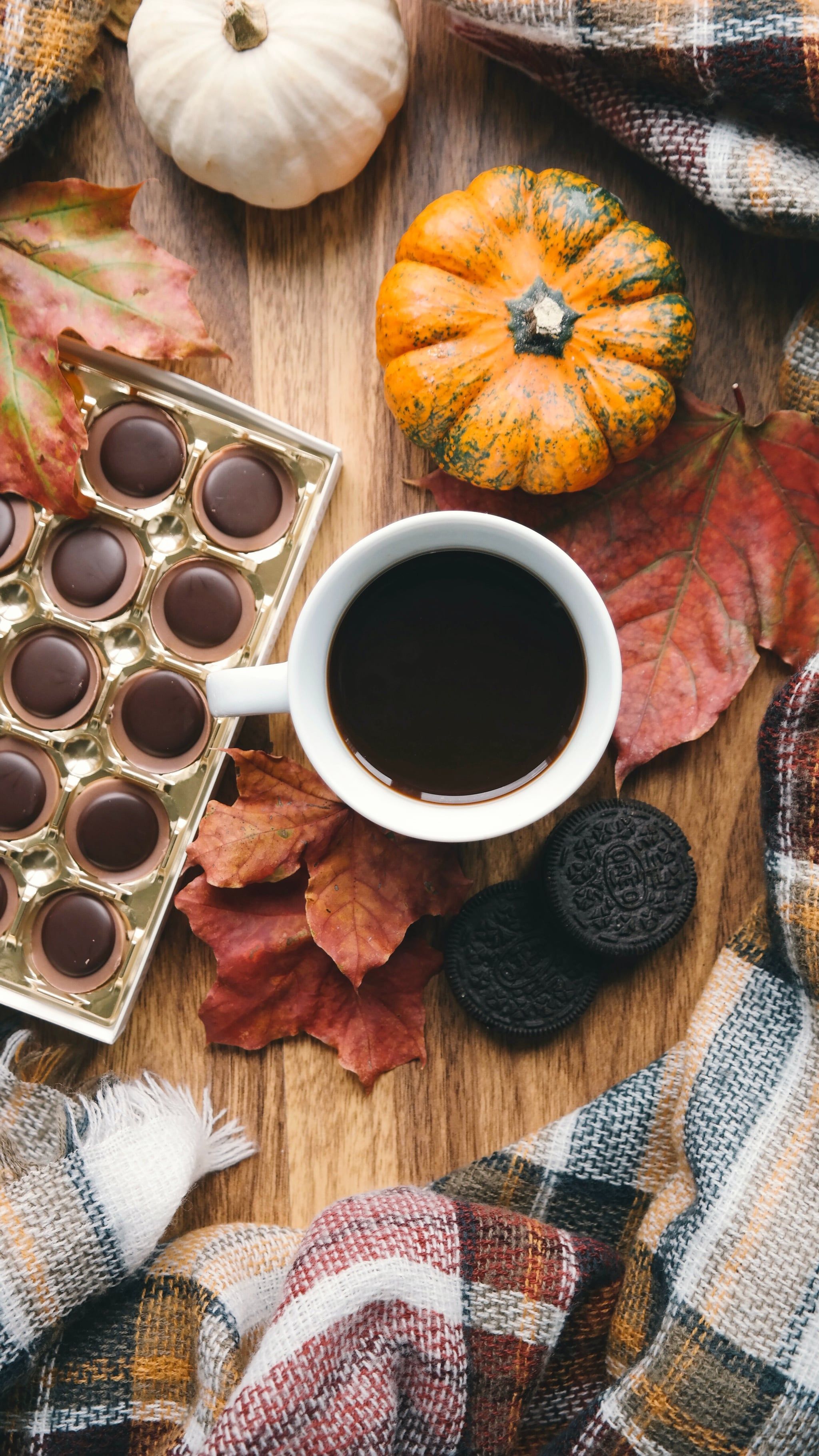 A cup of coffee and some chocolates on top - Thanksgiving