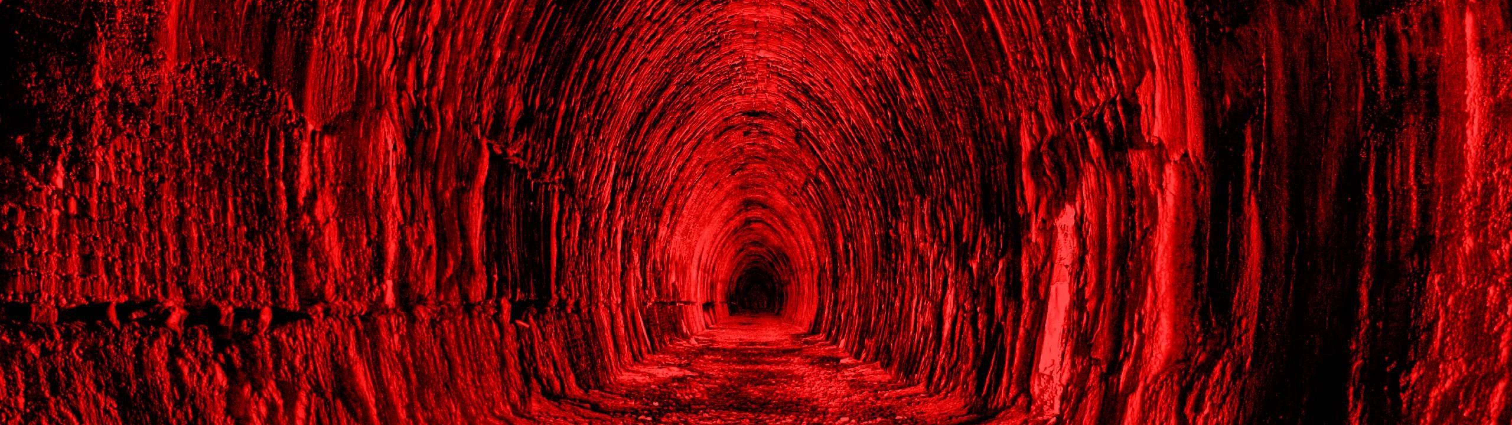 Red tunnel with a dark background - 5120x1440
