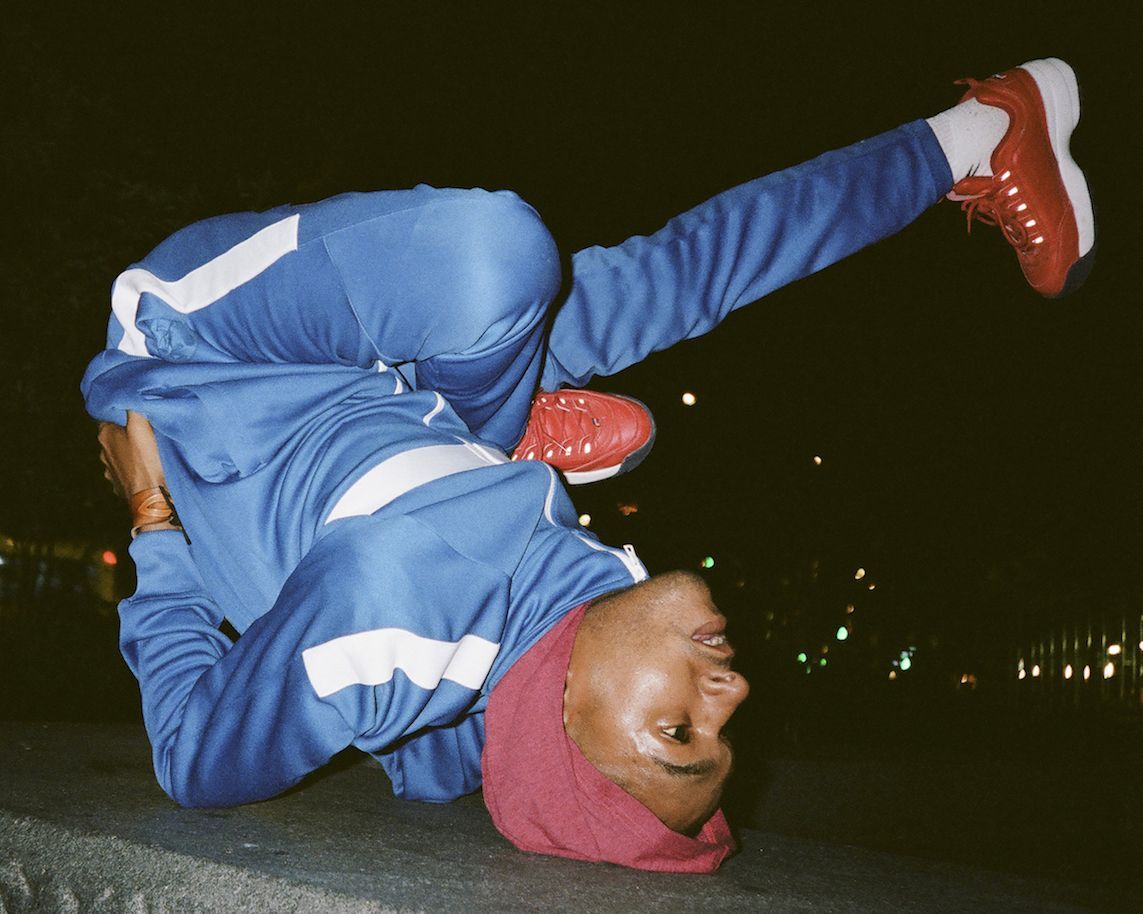 A man doing flips on the ground - Dance