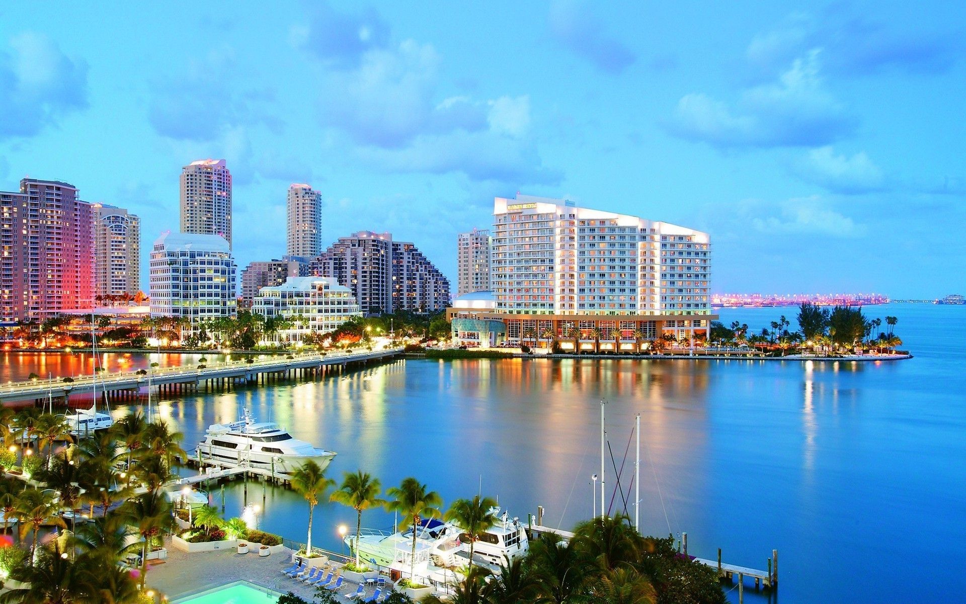 A city skyline with boats in the water - Miami