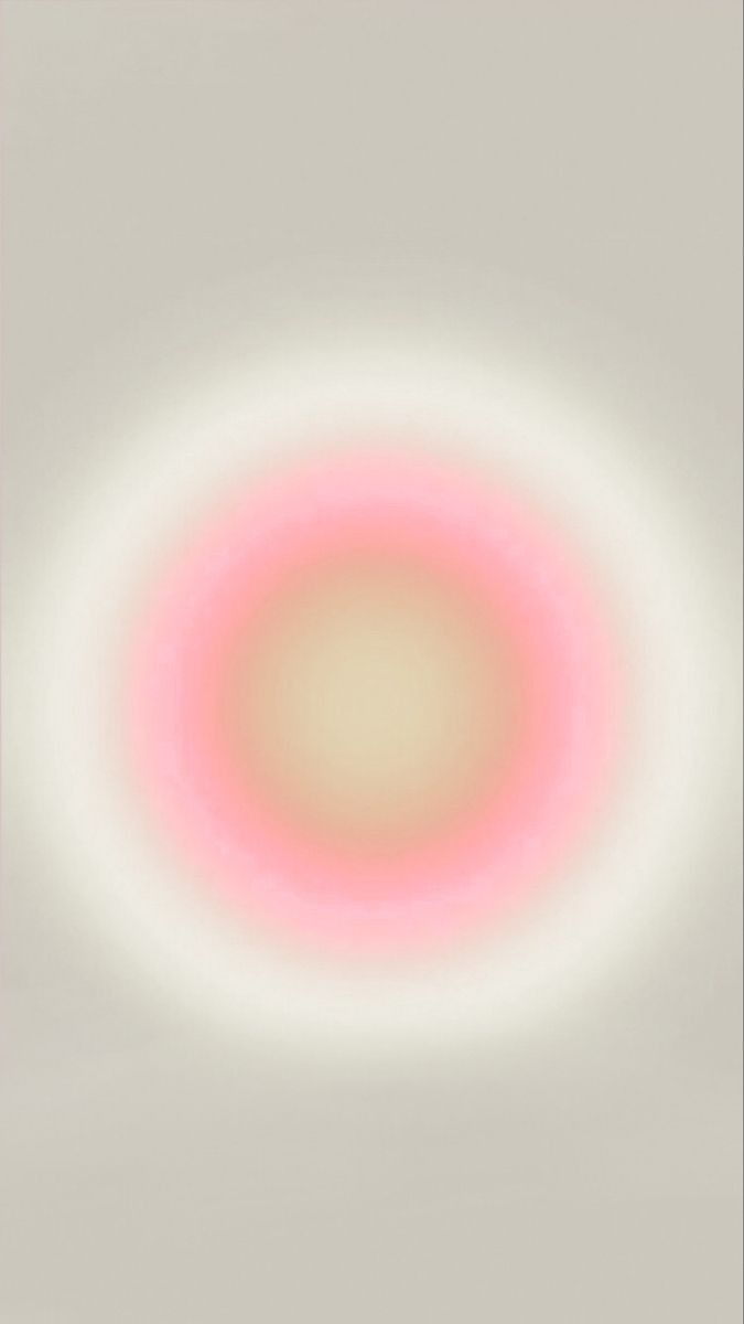 A pink and white circle on a grey background - Aura