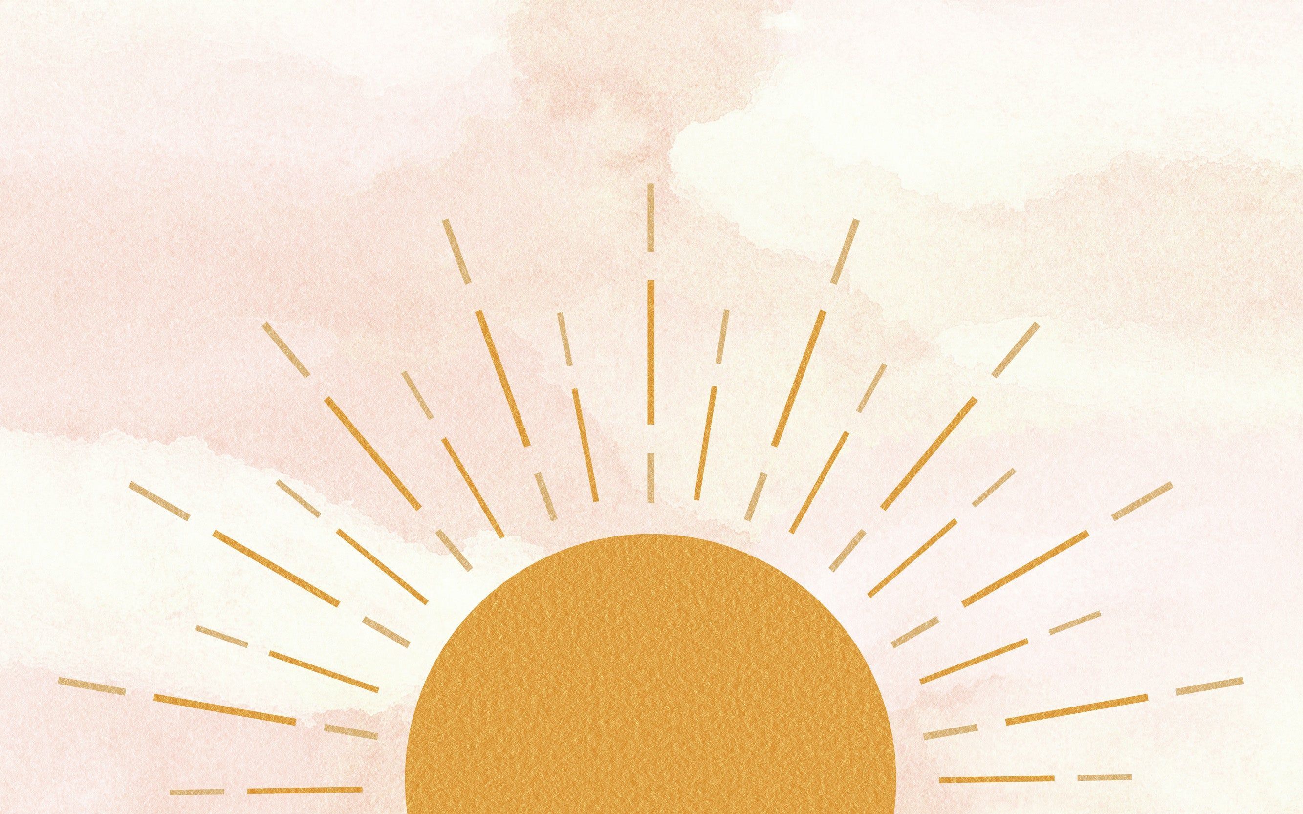 A sun with rays on a watercolor background - Sunshine