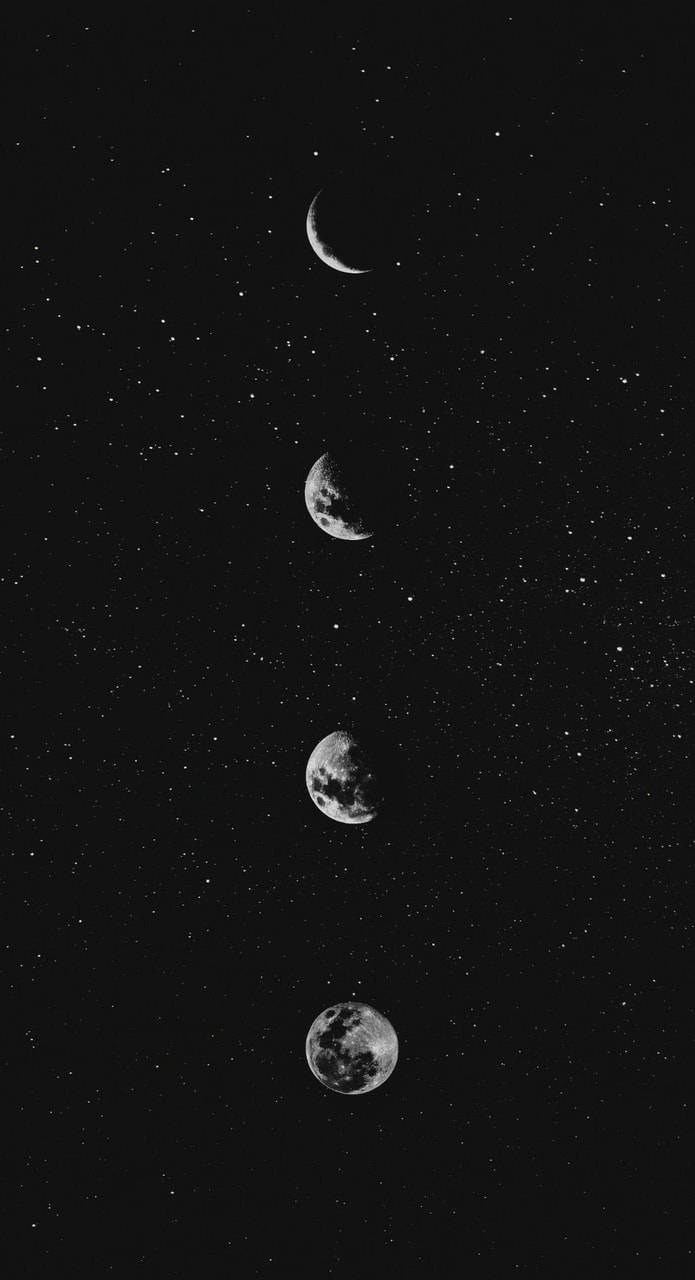 The phases of earth in a black and white photo - Moon phases
